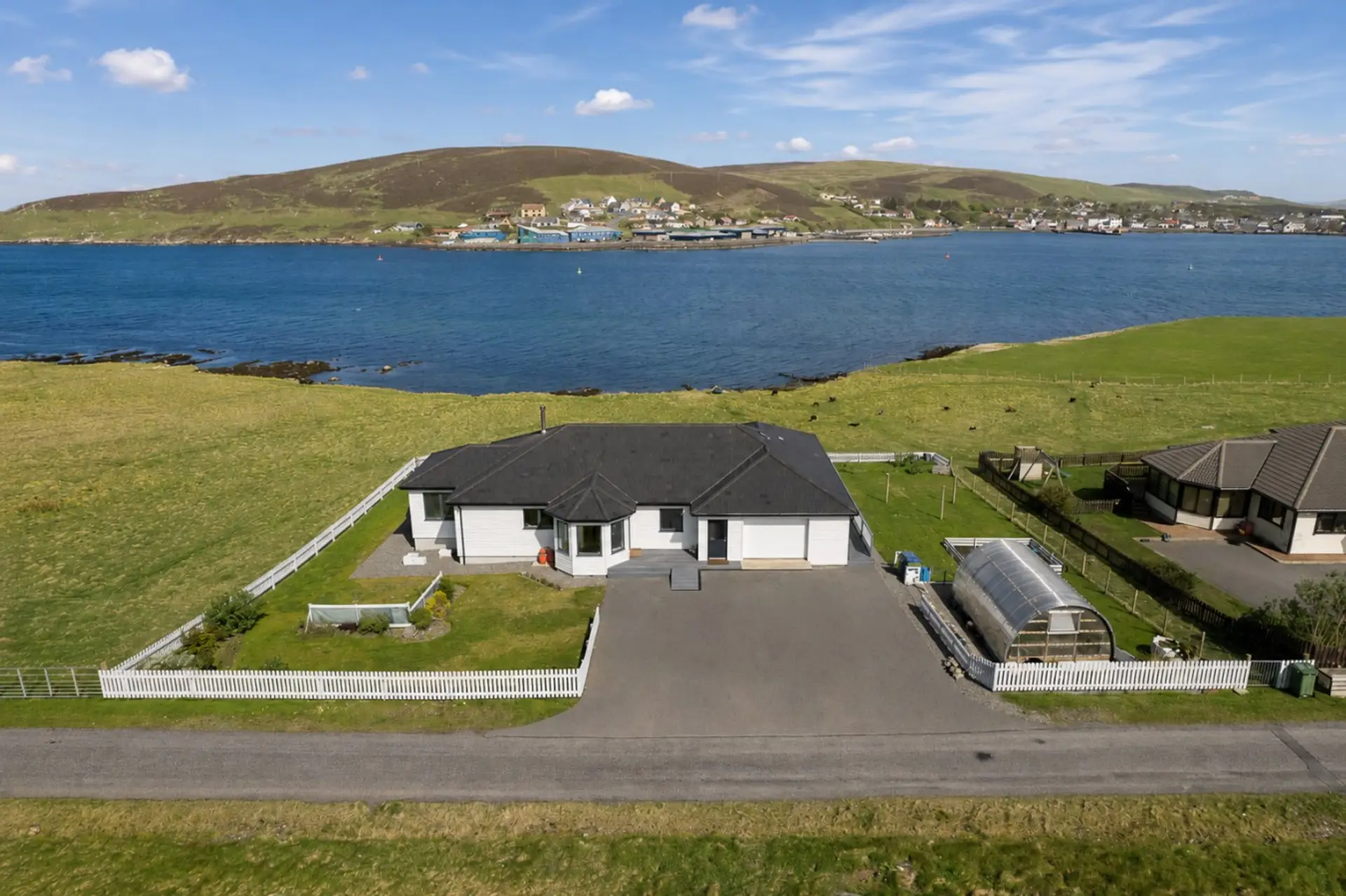 Exterior view of the property with coastal views