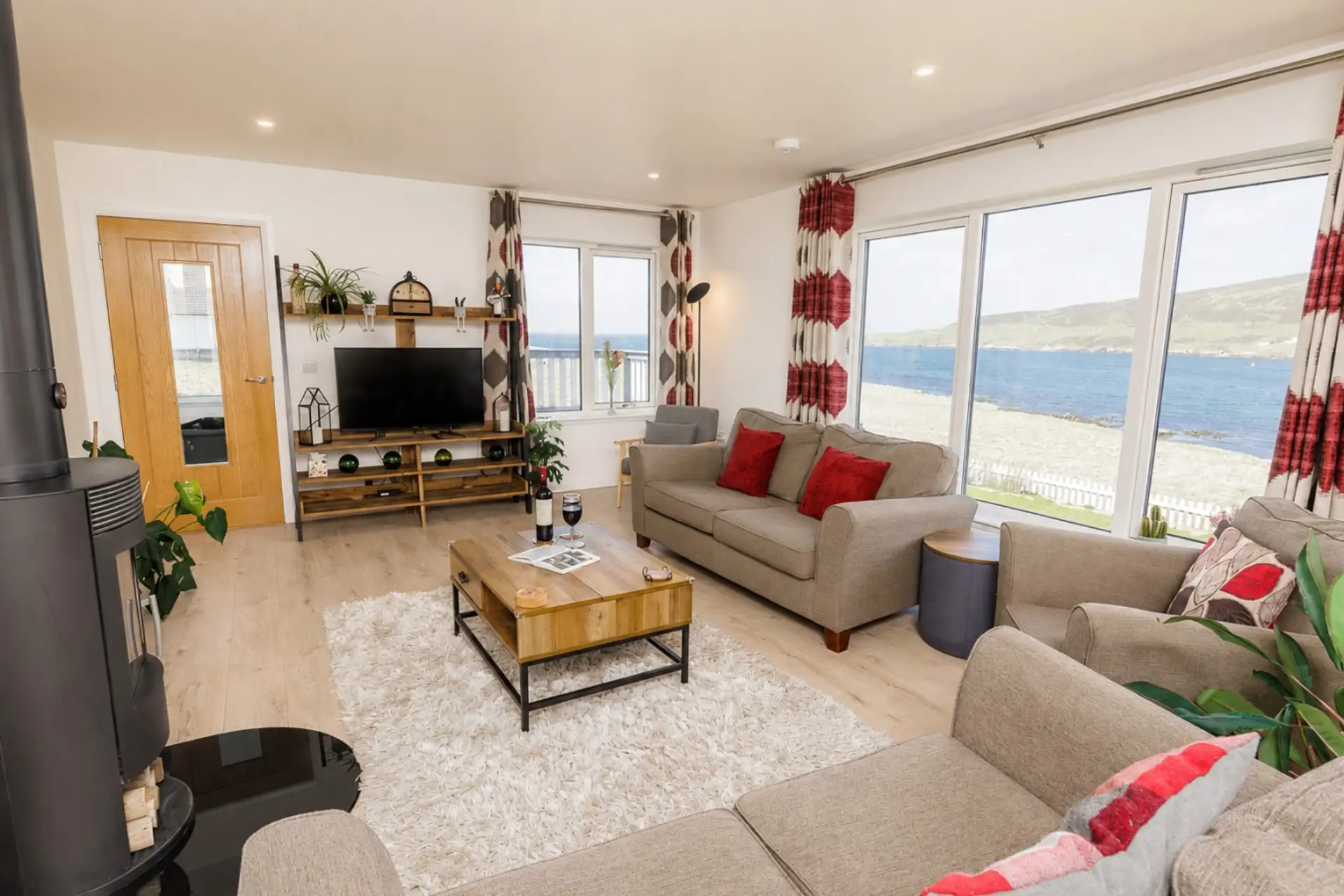 Living area with large windows and sea views