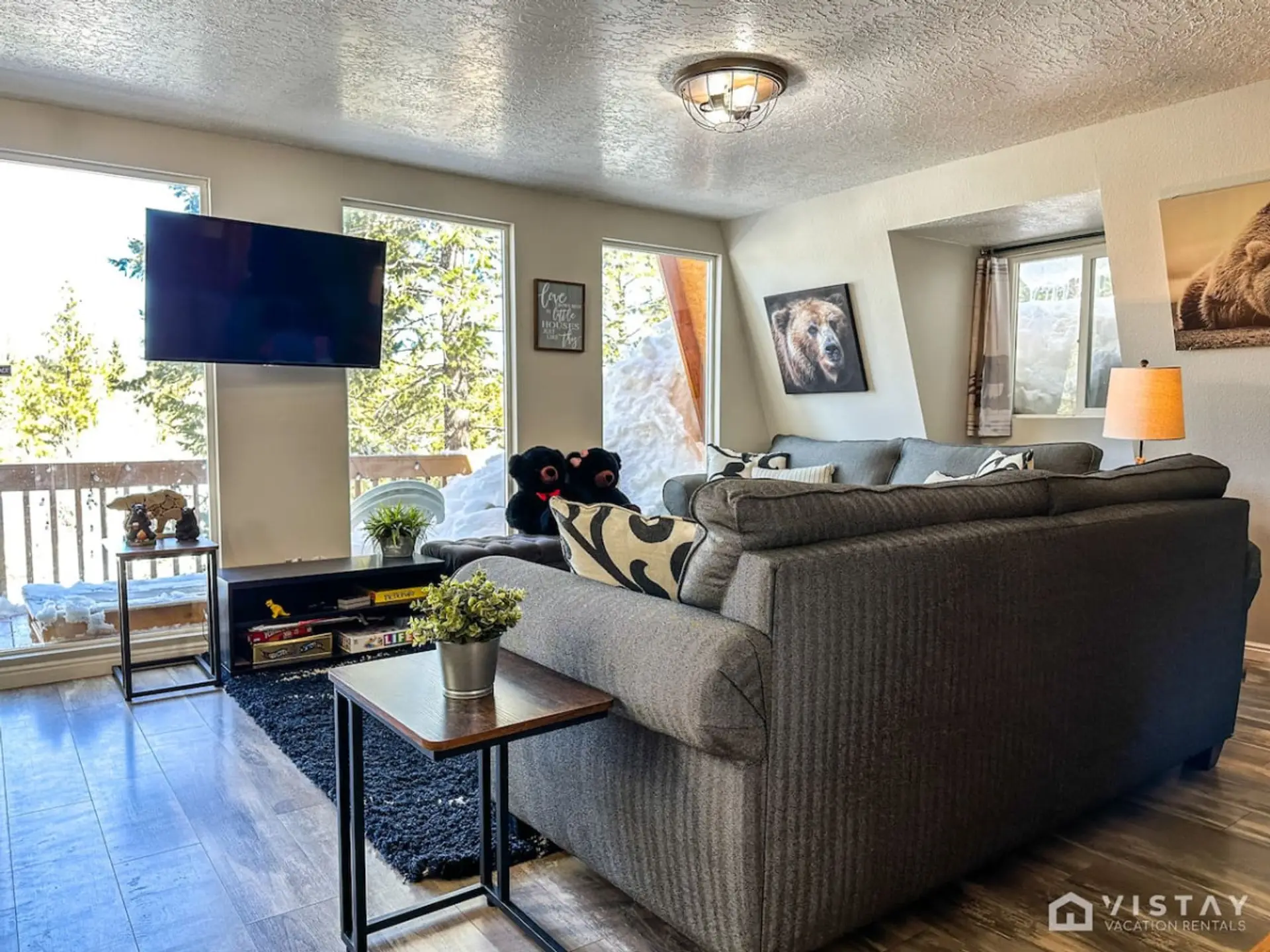 This beautiful cabin offers plenty of space for everyone to feel comfortable! Step inside to an inviting open kitchen/dining/family room area complete with a wood-burning stove. The super comfy sofa is the perfect spot to relax