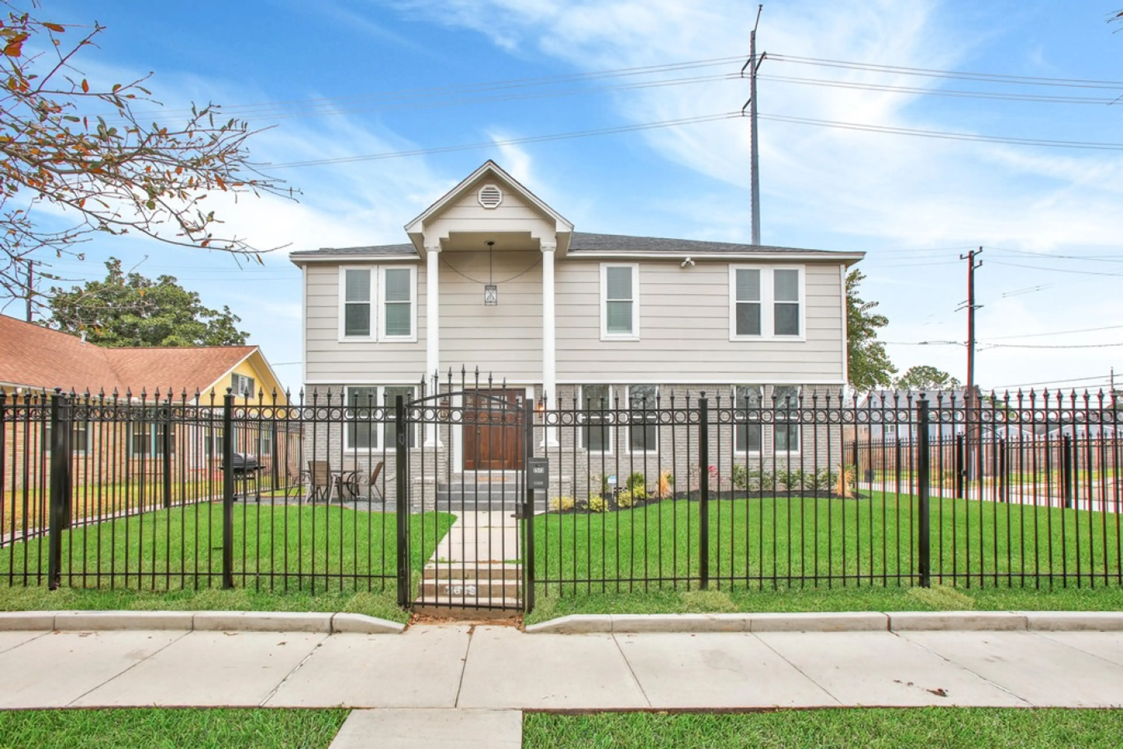 Take in the sight of the fully secured property from the front. Experience peace of mind with two pedestrian gates and one automatic vehicle gate, ensuring your safety while you're our valued guest.