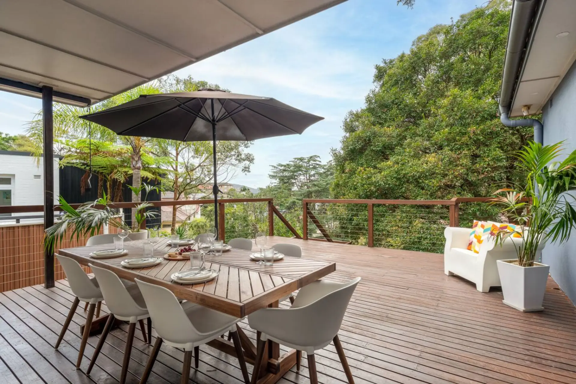 The elevated, leafy setting creates a private escape just a short walk from Balmoral Beach