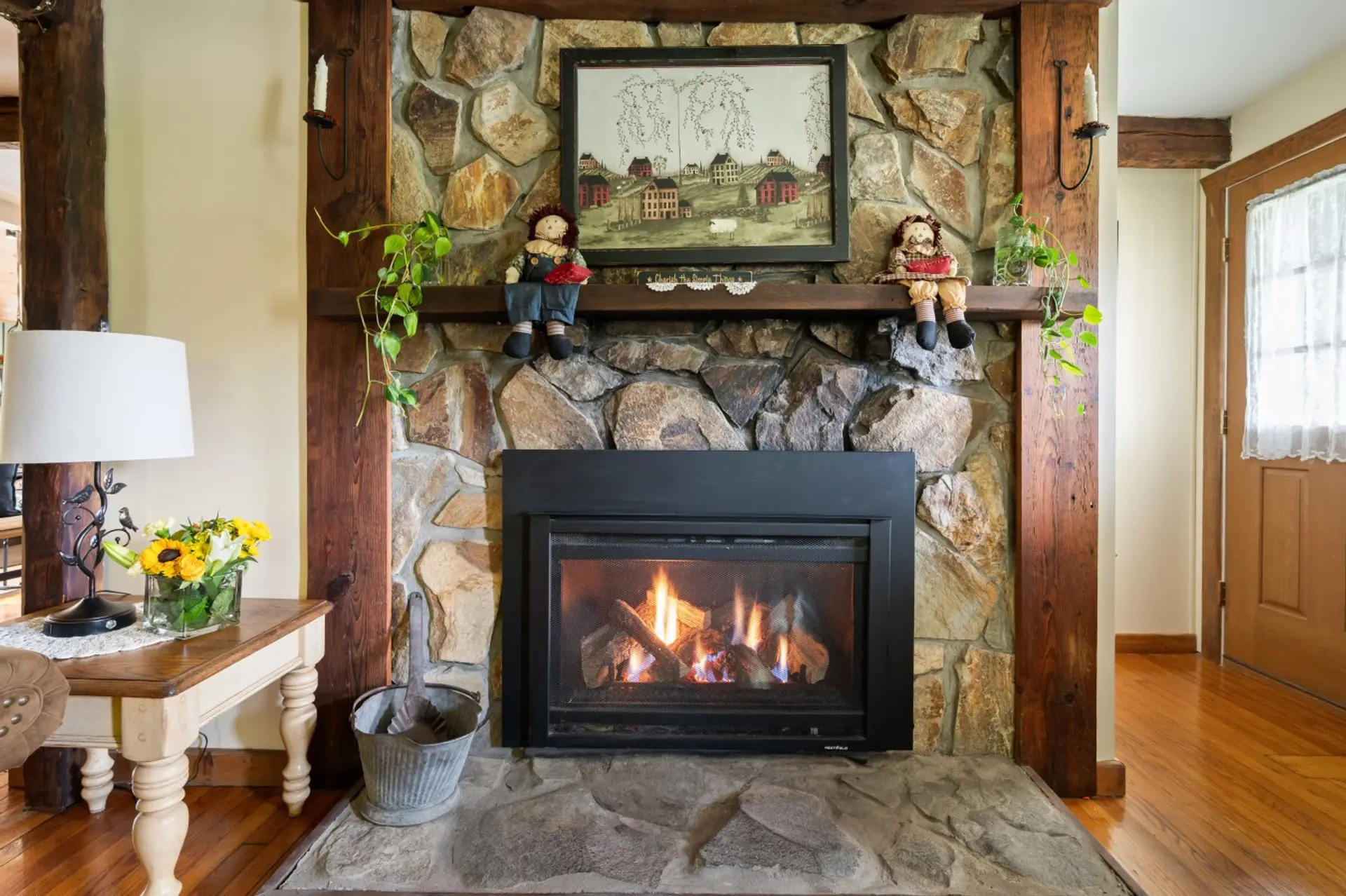 Stone fireplace lit and the room goes quiet.