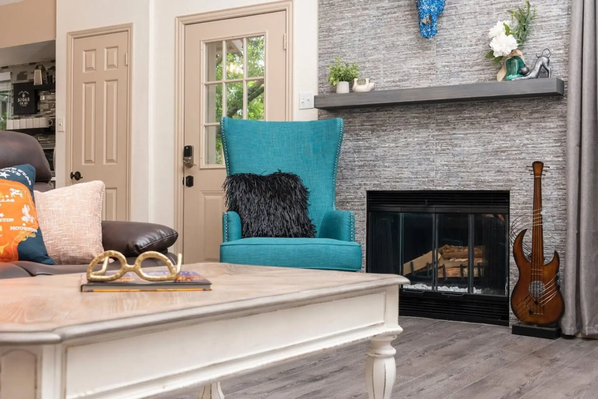 Cozy movie nights by the fireplace in this Austin vacation rental.