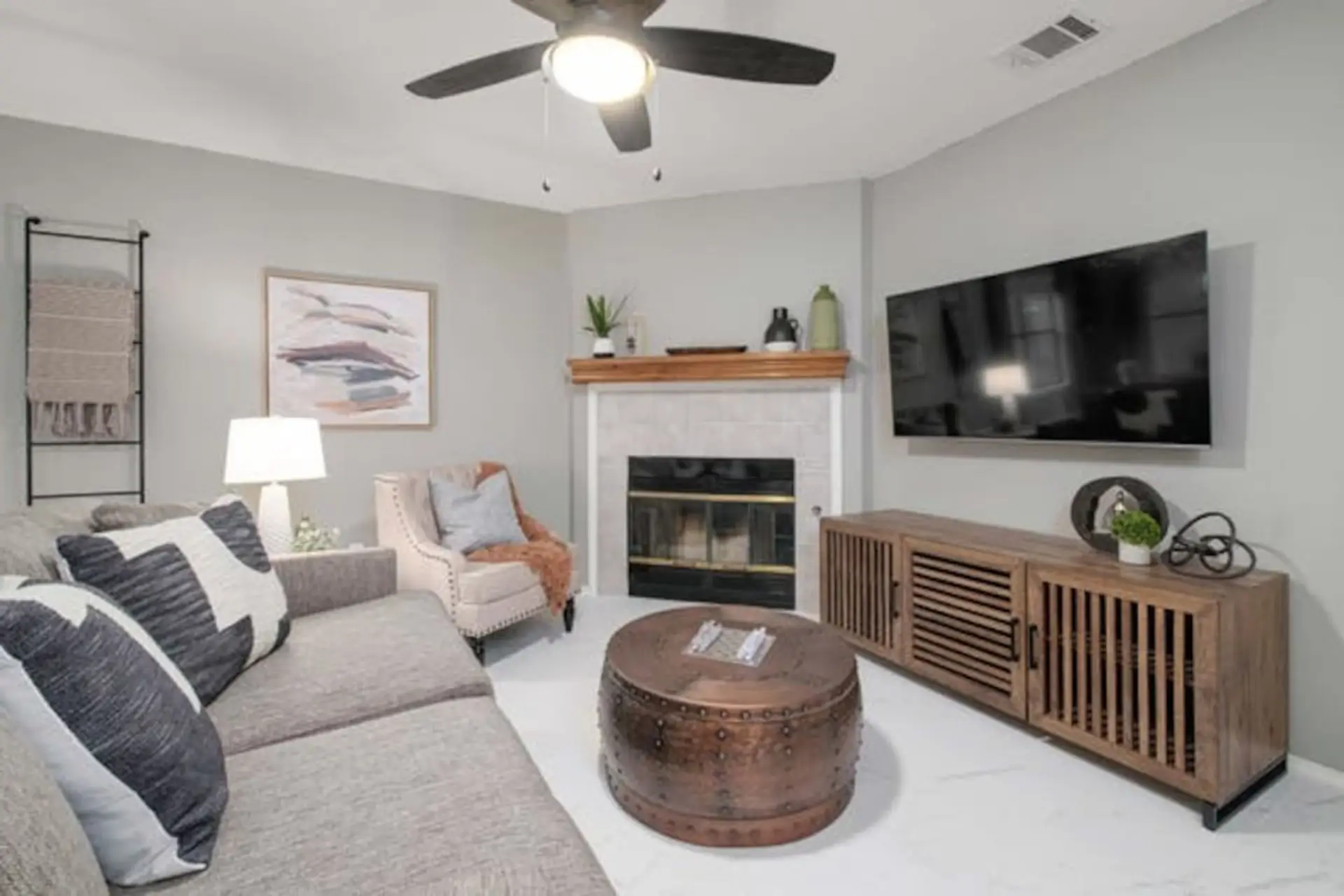 Relaxing evenings by the fireplace in this bright Austin vacation rental.