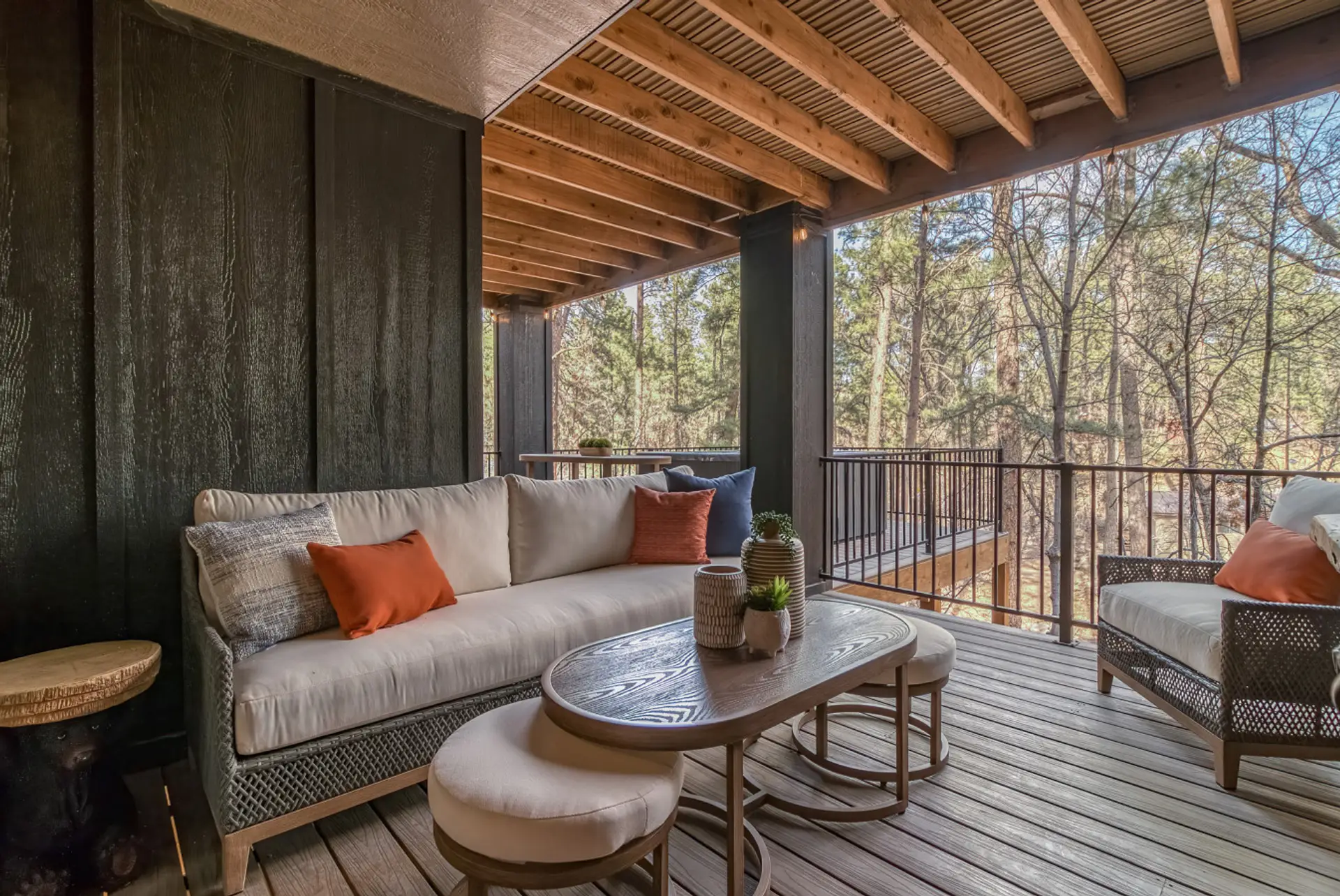 Covered river-view deck perfect for morning coffee in Ruidoso