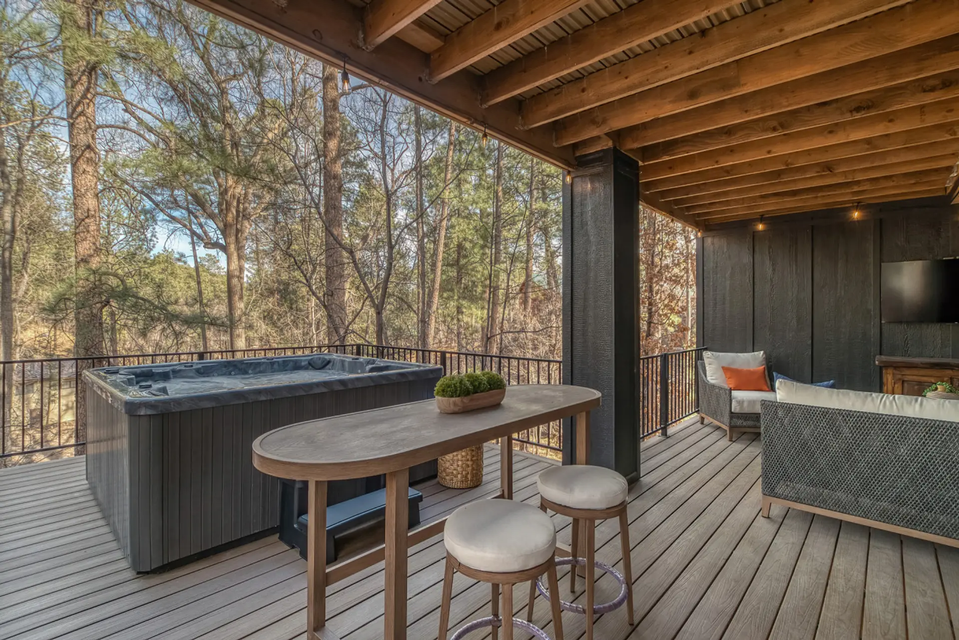 Soak in a private hot tub above the Rio Ruidoso just steps from Midtown shopping and dining