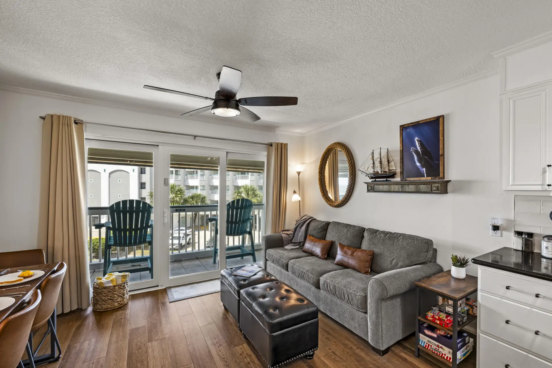 Bright, comfortable living room with direct access to your private balcony and Gulf views.