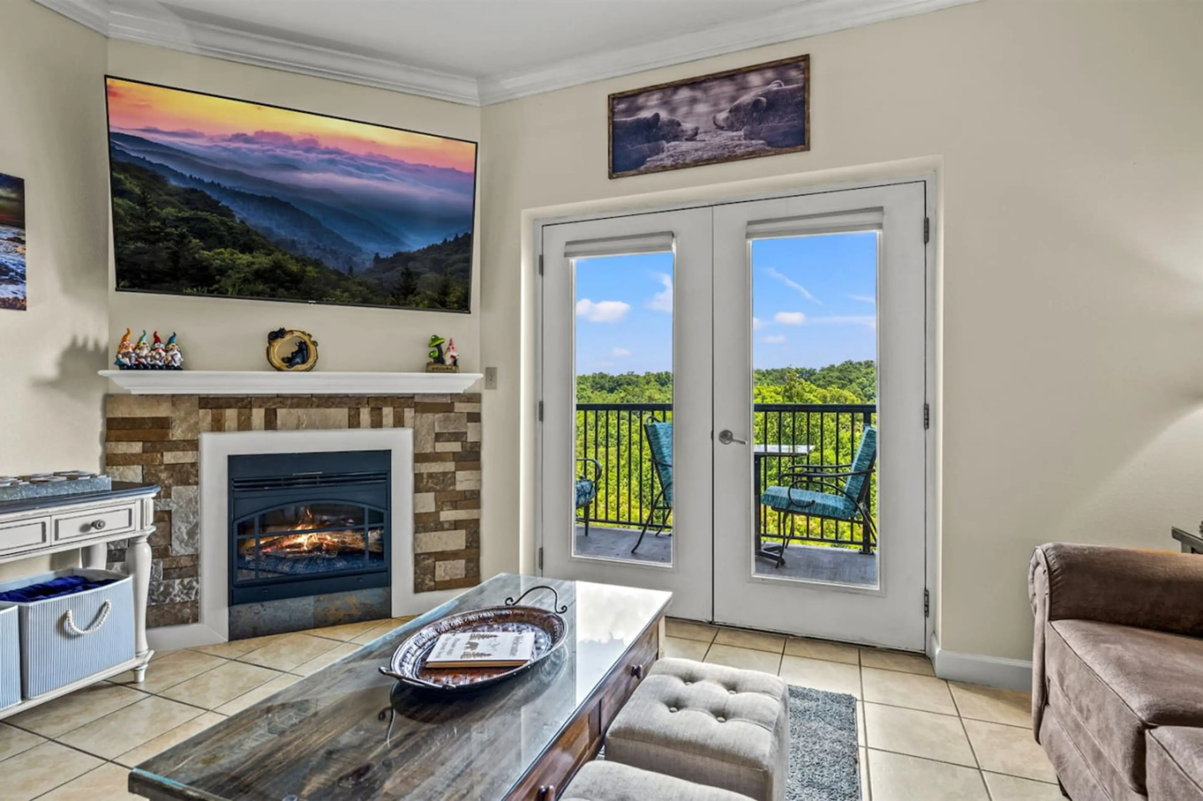 Relax in front of the Large flatscreen TV and fireplace or unwind on the balcony with amazing Smoky Mountain views!
