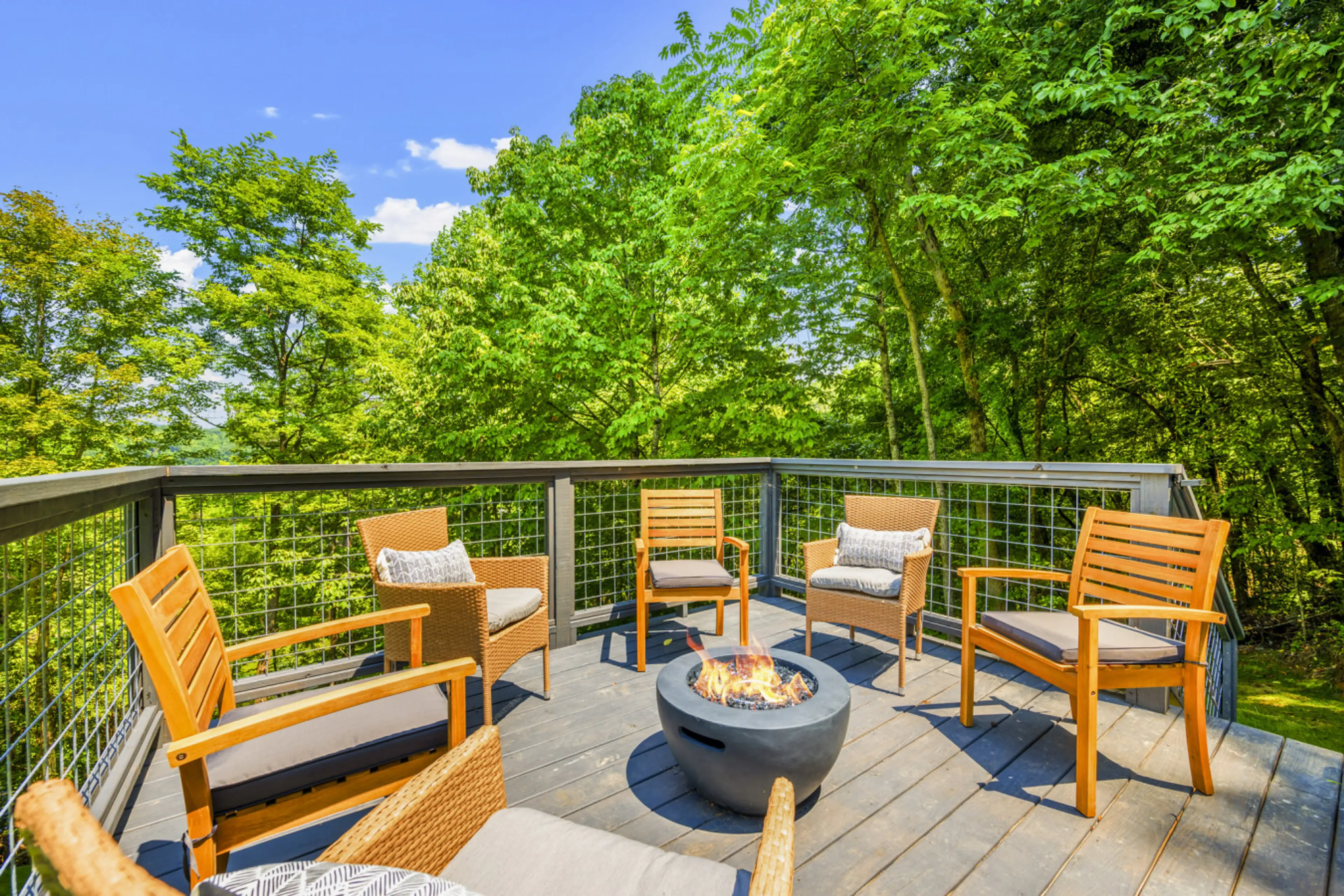 A private firepit nestled in the trees
