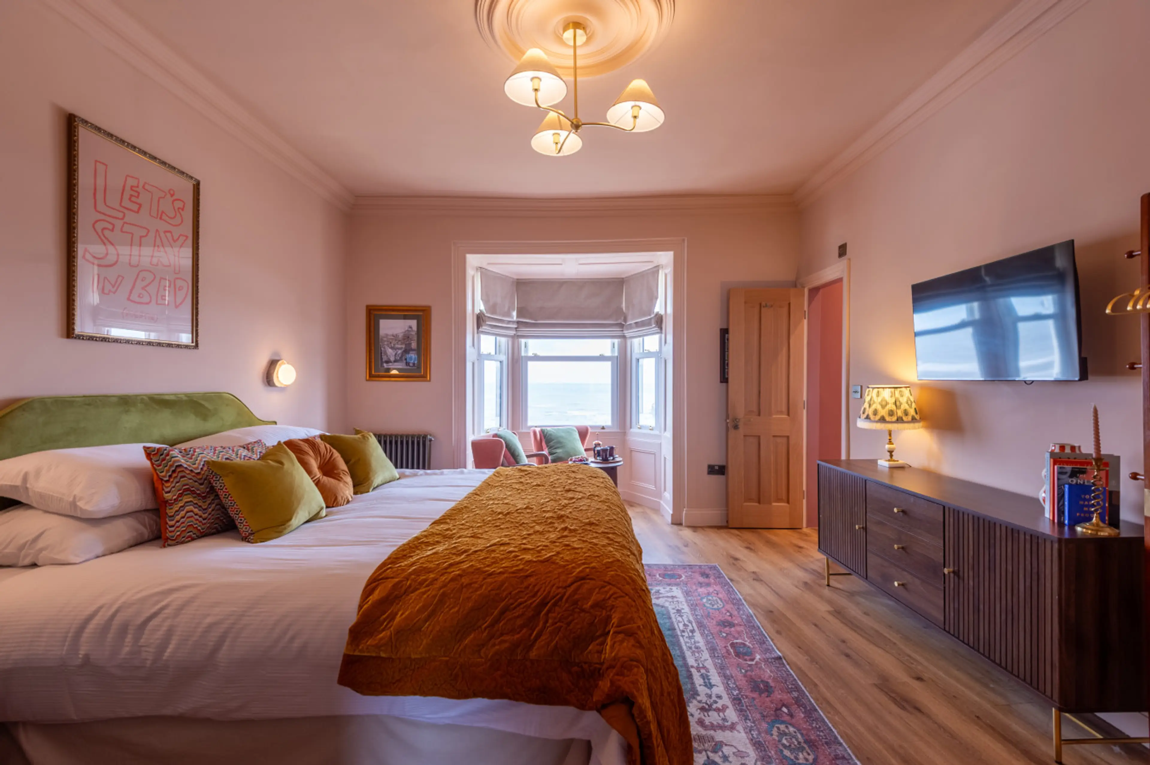 Room Two at The Beach House is a bright, comfortable sea-view room in Sunderland, featuring a private en-suite bathroom and stylish coastal décor. Perfect for couples or small groups, this room can also connect with Room Three to create a spacious family 