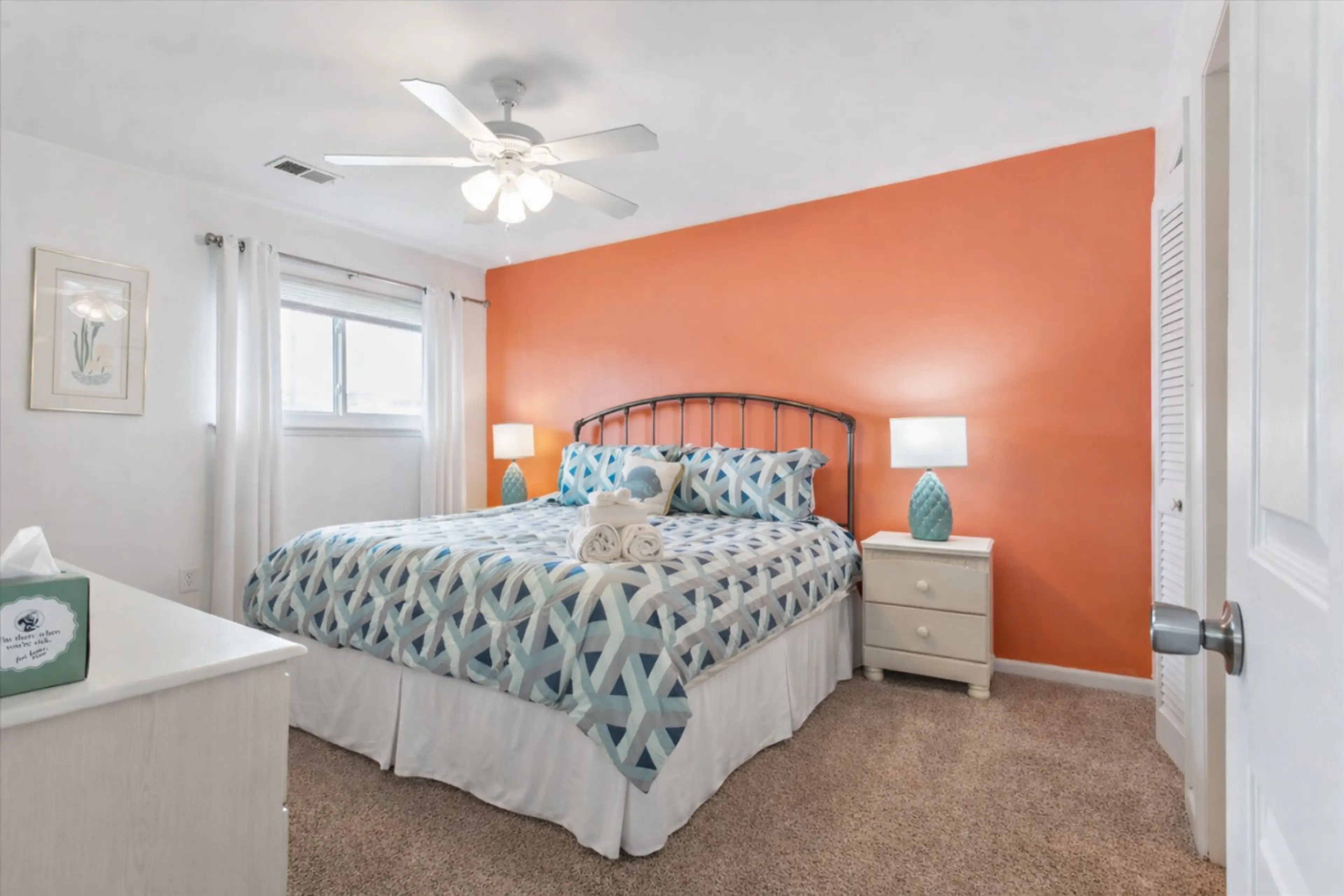 Our master suite has the shared bathroom attached to it here. Enjoy this King bed luxury!