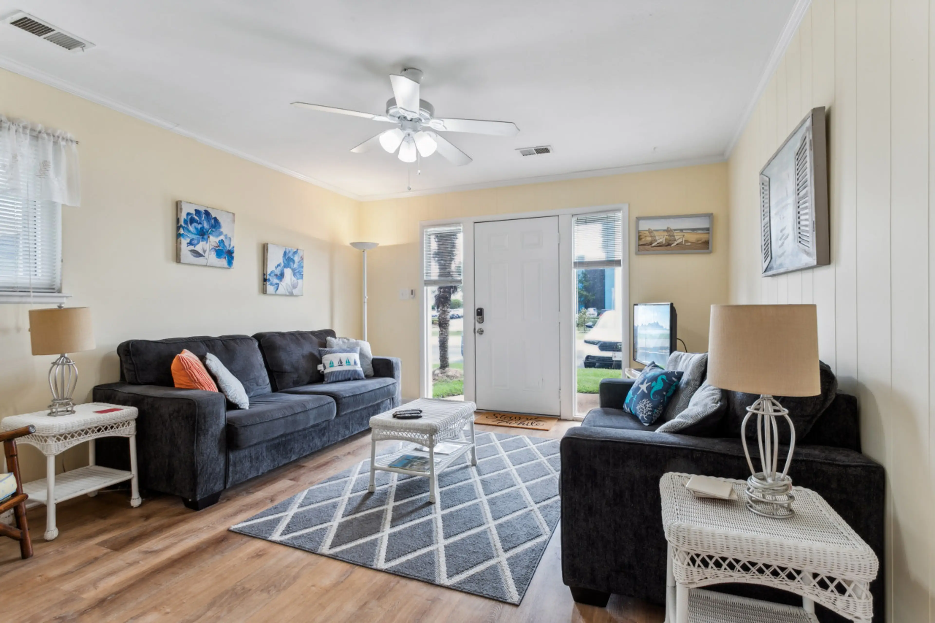 Walk into a comfortable living room space that can hold everyone around the tv!