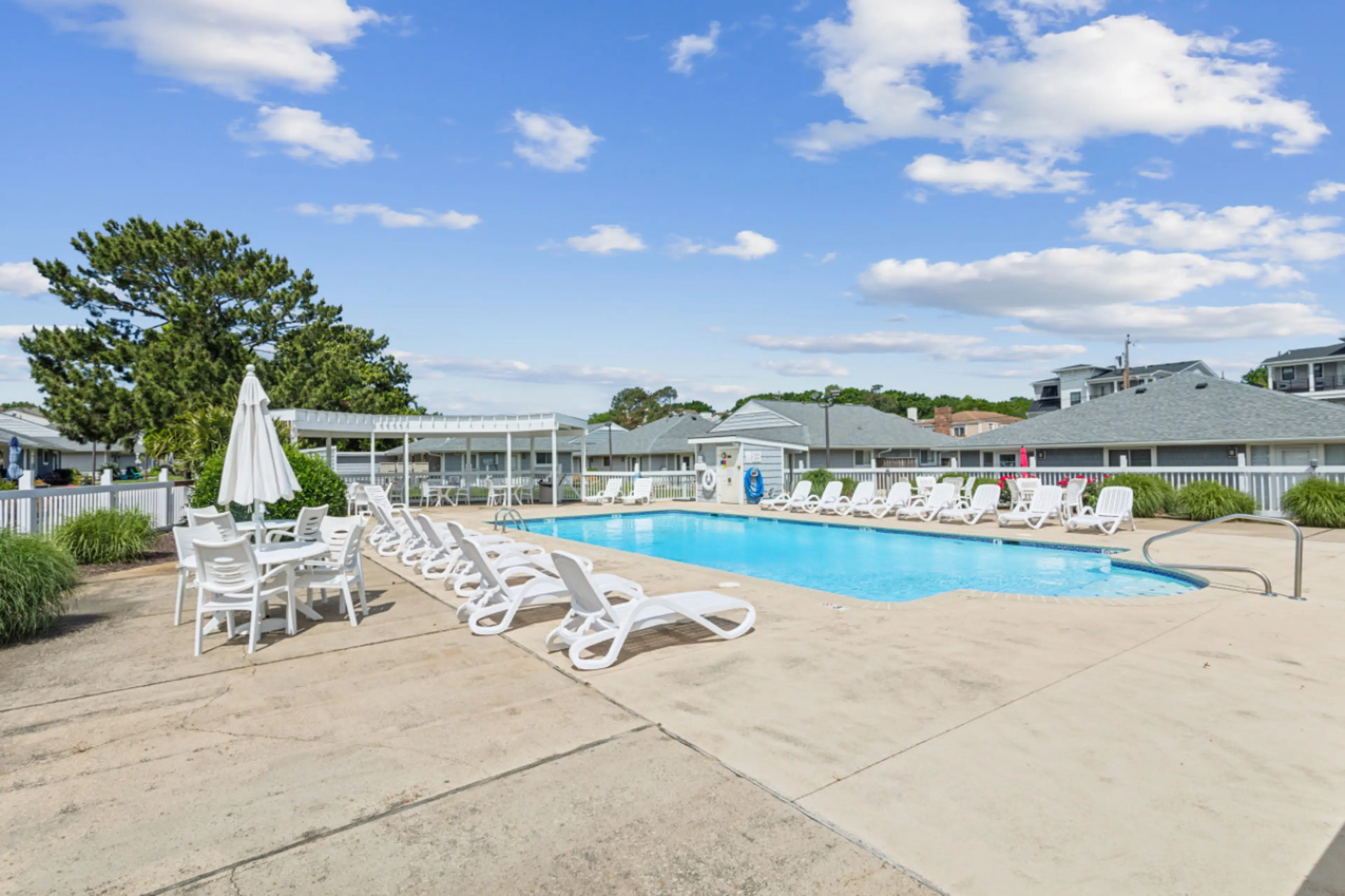 Suntan, swim, soak - whatever your vibe is, this pool deck and pool offer it!