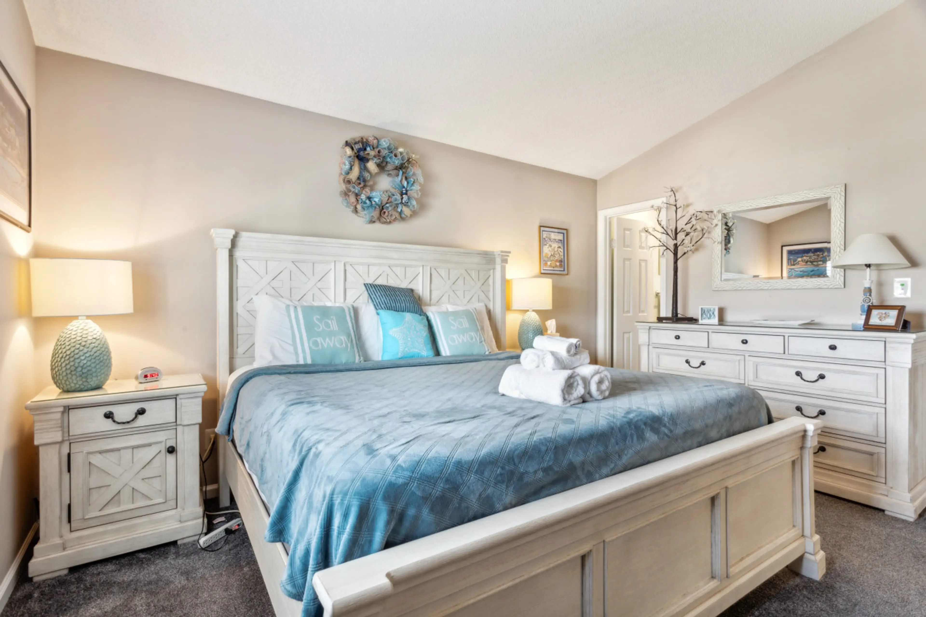 Our master suite bedroom with a king bed and private attached bathroom.