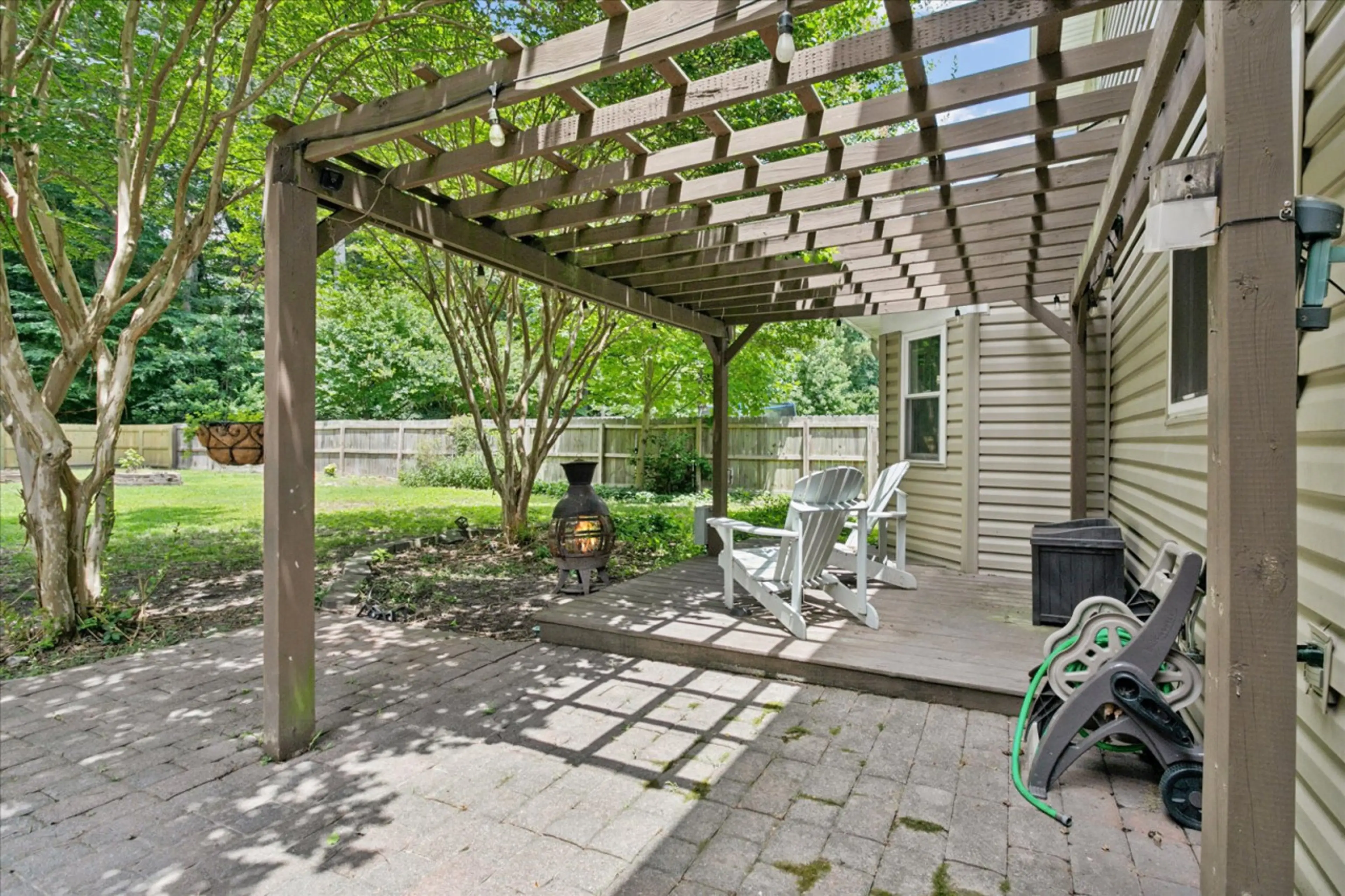 The backyard is pure luxury and relaxation! Sit in the breeze or by the fire, whichever you choose.