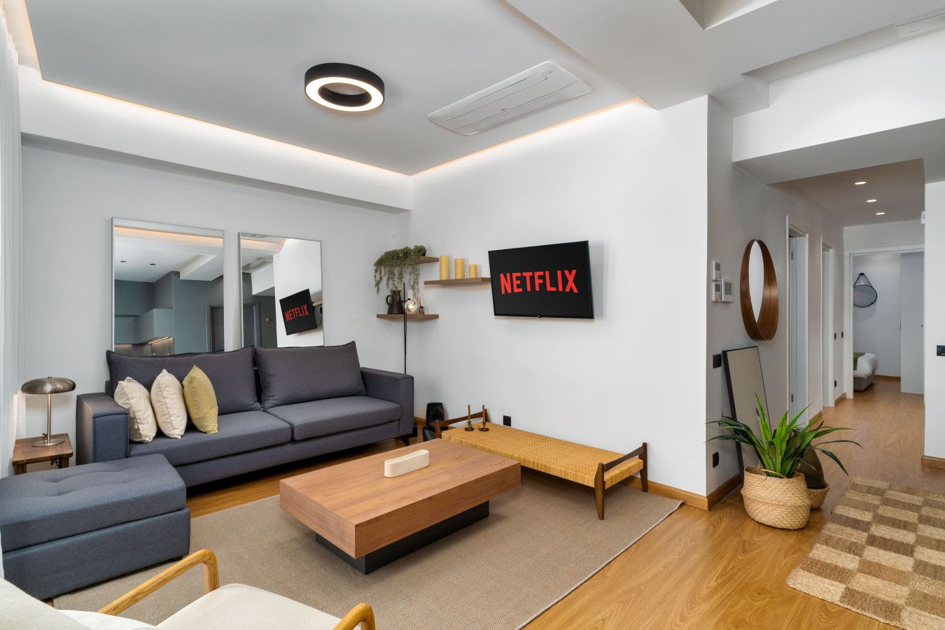 Living room of Ofi the Fourth, a renovated two-bedroom for sale in central Athens, operated by Cheez Hospitality