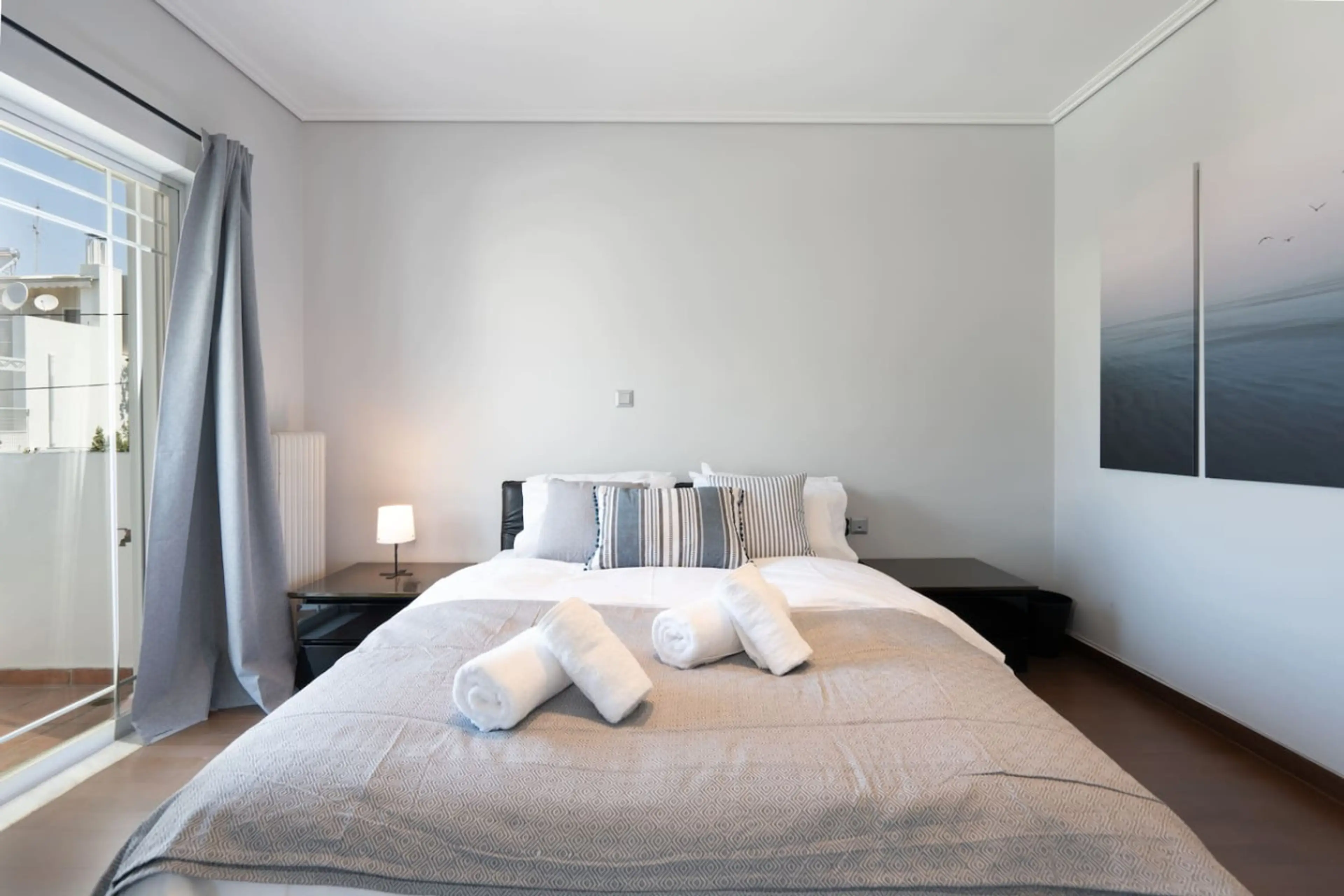 bright, restful bedroom with premium linens, blackout curtains and smart TV. Designed for deep sleep after long Athens days. Booking.com tag: Bedroom