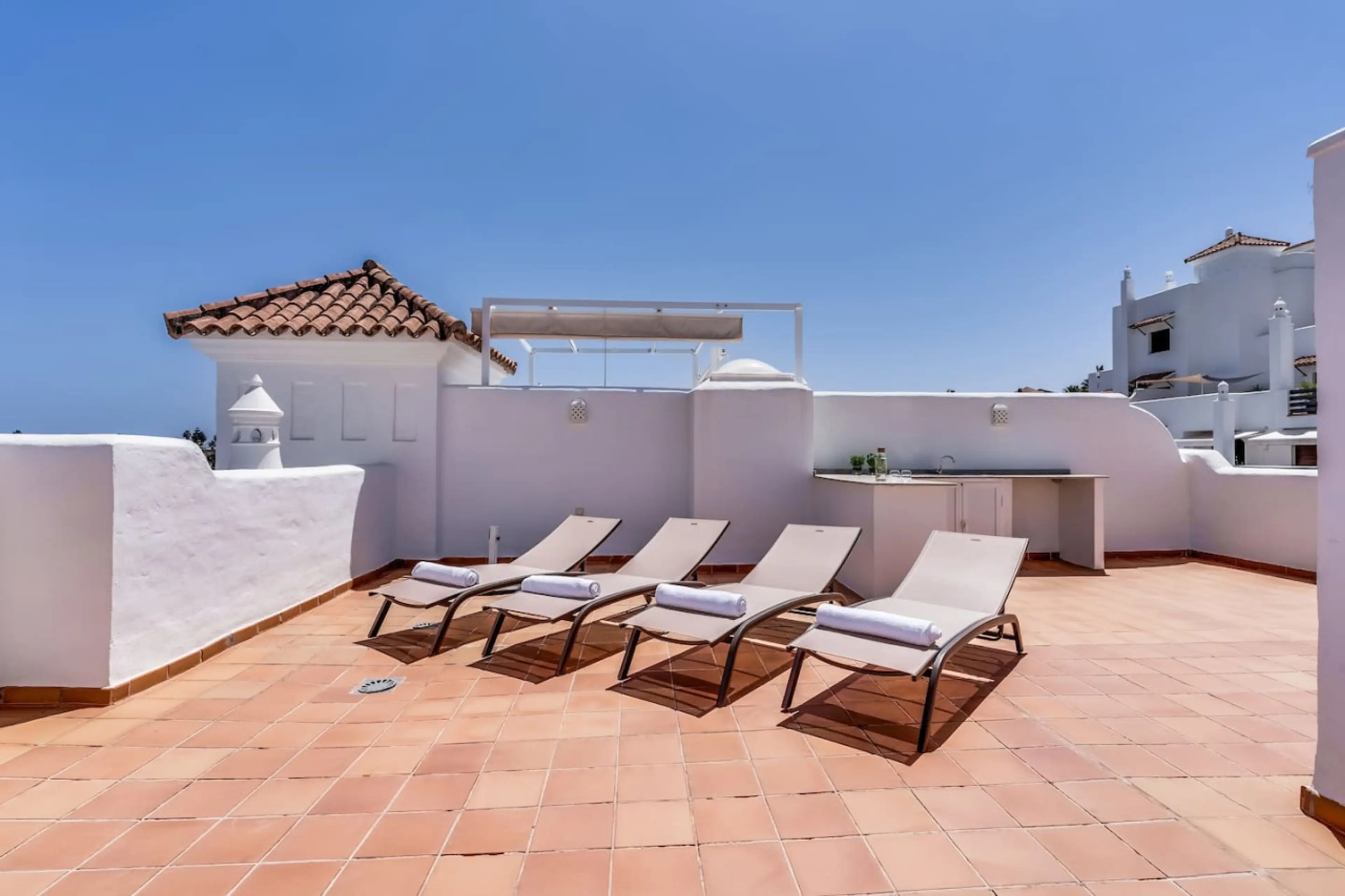 - Private rooftop terrace with sun loungers perfect for all day sunshine - Outdoor chill area ideal for tanning relaxing and sunset moments - Holiday rental with large terrace near beach golf and coastal paths