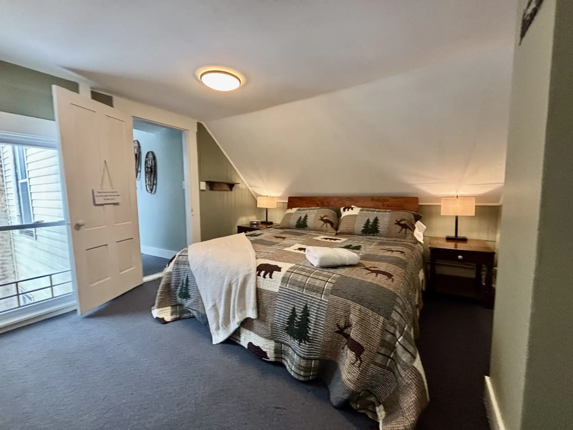 King Bed with 100% cotton sheets, fluffy duvet, extra pillows and blankets
