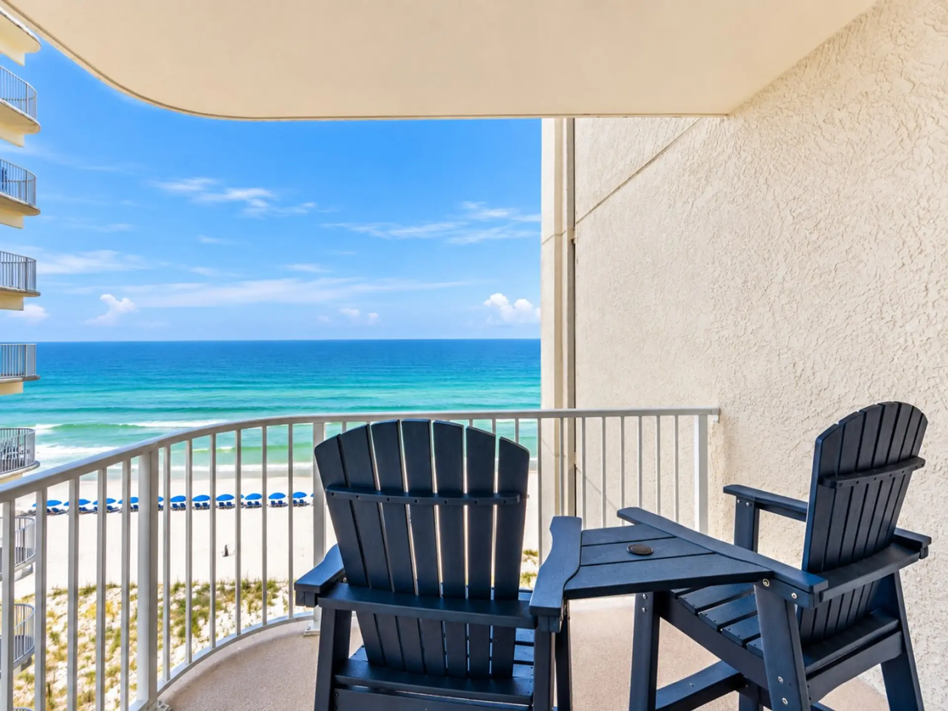 Private balcony seating with beautiful views of the Gulf and beach.