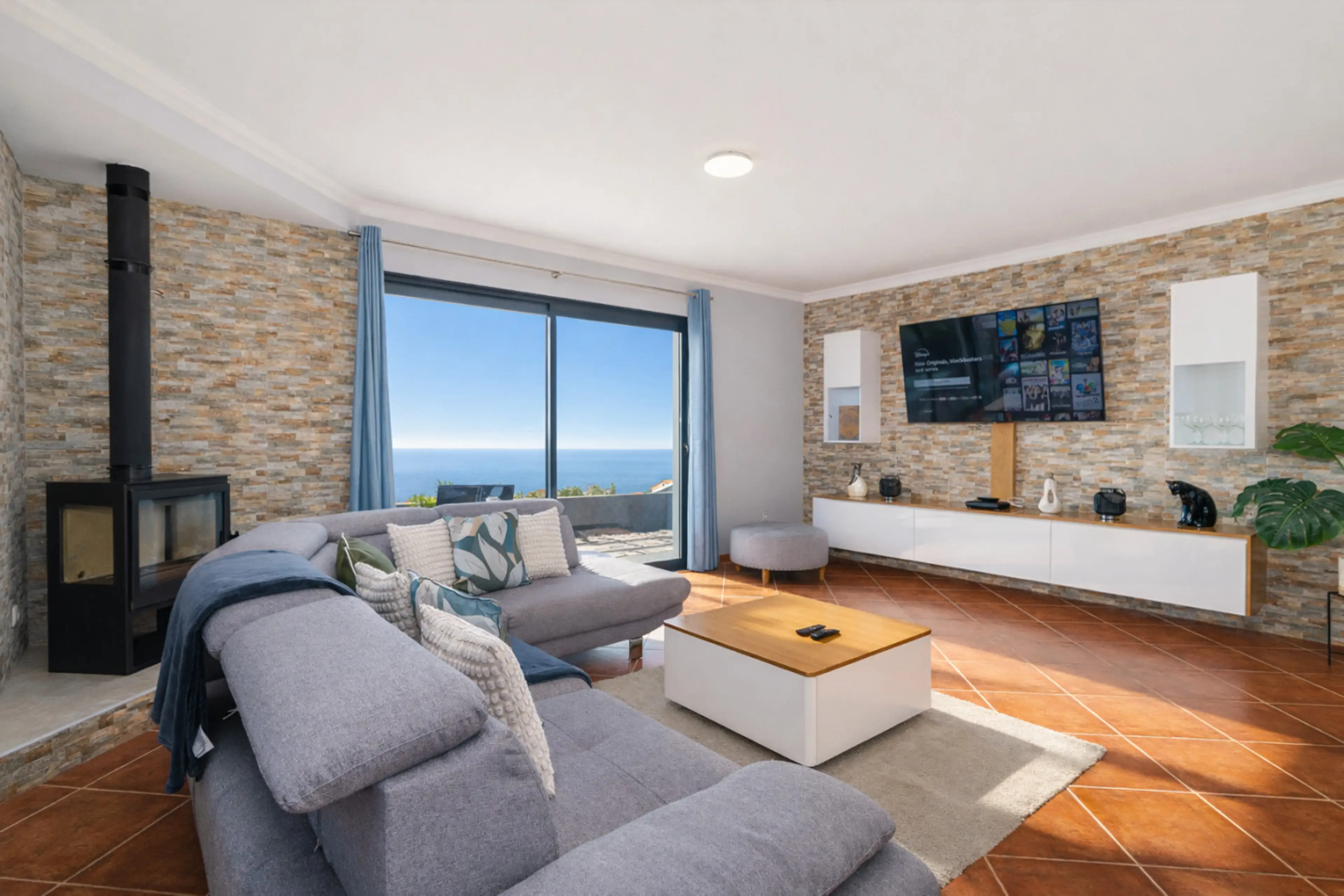 Experience slow living in a bright, sea-view living room designed for calm, privacy and understated elegance on Madeira Island.