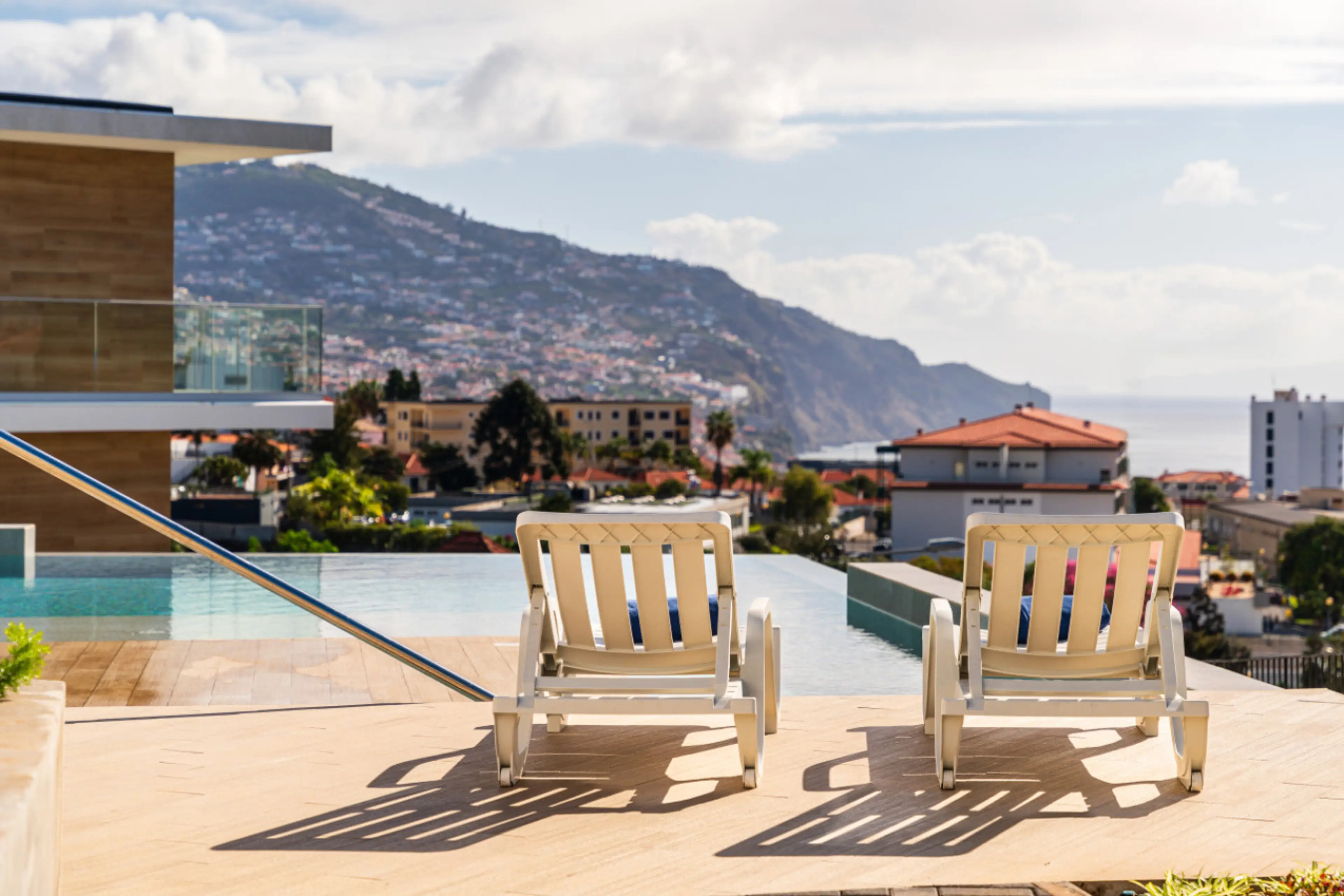 Unwind by the infinity pool as sweeping ocean and mountain vistas create a perfect backdrop for pure relaxation.