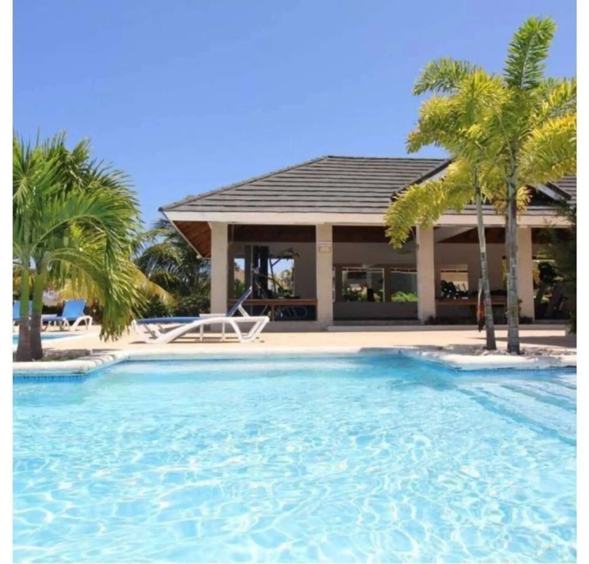 Take a refreshing dip in the sparkling pool beside a shaded pavilion perfect for lounging out of the sun.