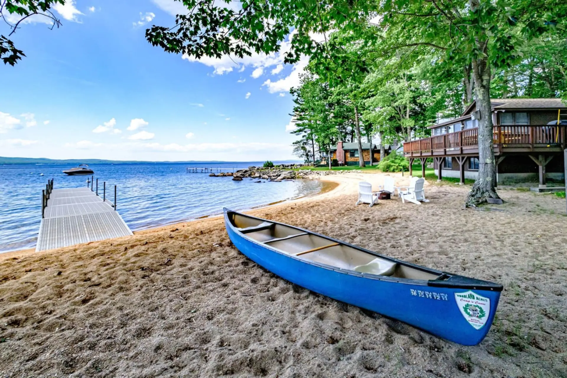 Exterior | Sandy beach with chairs surrounding fire pit. Access to beach floats, kayaks, SUPs and a canoe. Private dock and mooring as well.