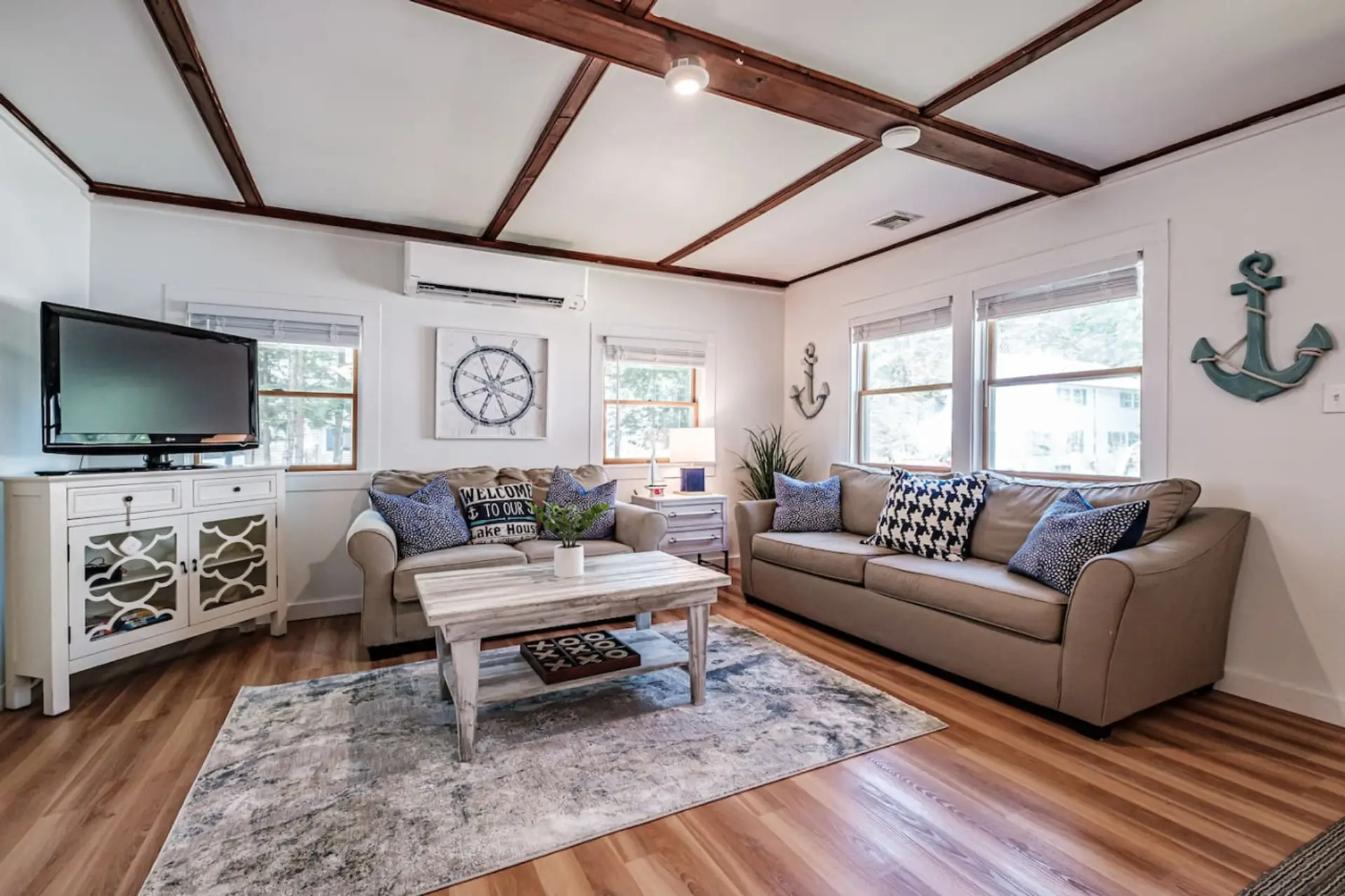 Living area with pullout sofa, fireplace and smart TV