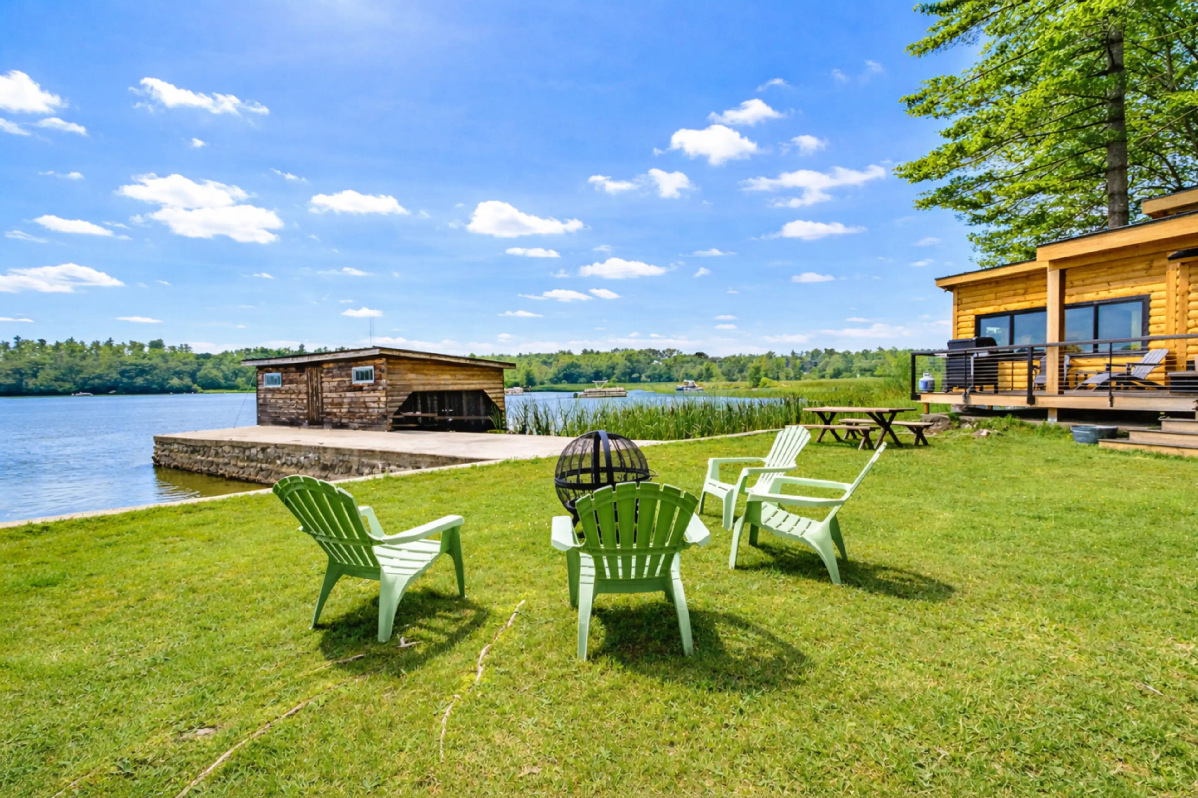 Exterior View - Fire pit with 30 ft of private sandy beach area.