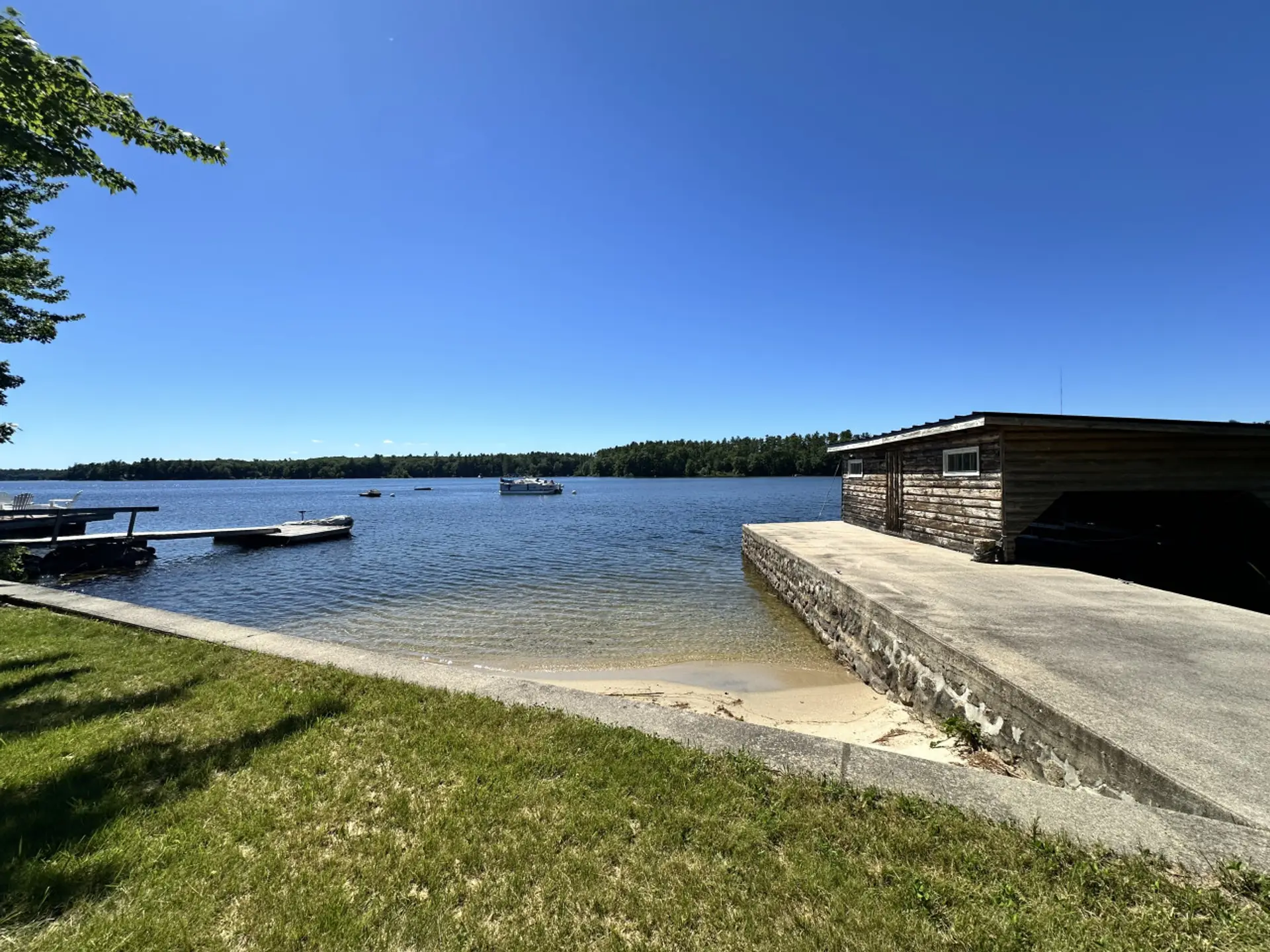 Exterior View - 30 ft of private sandy beach area.