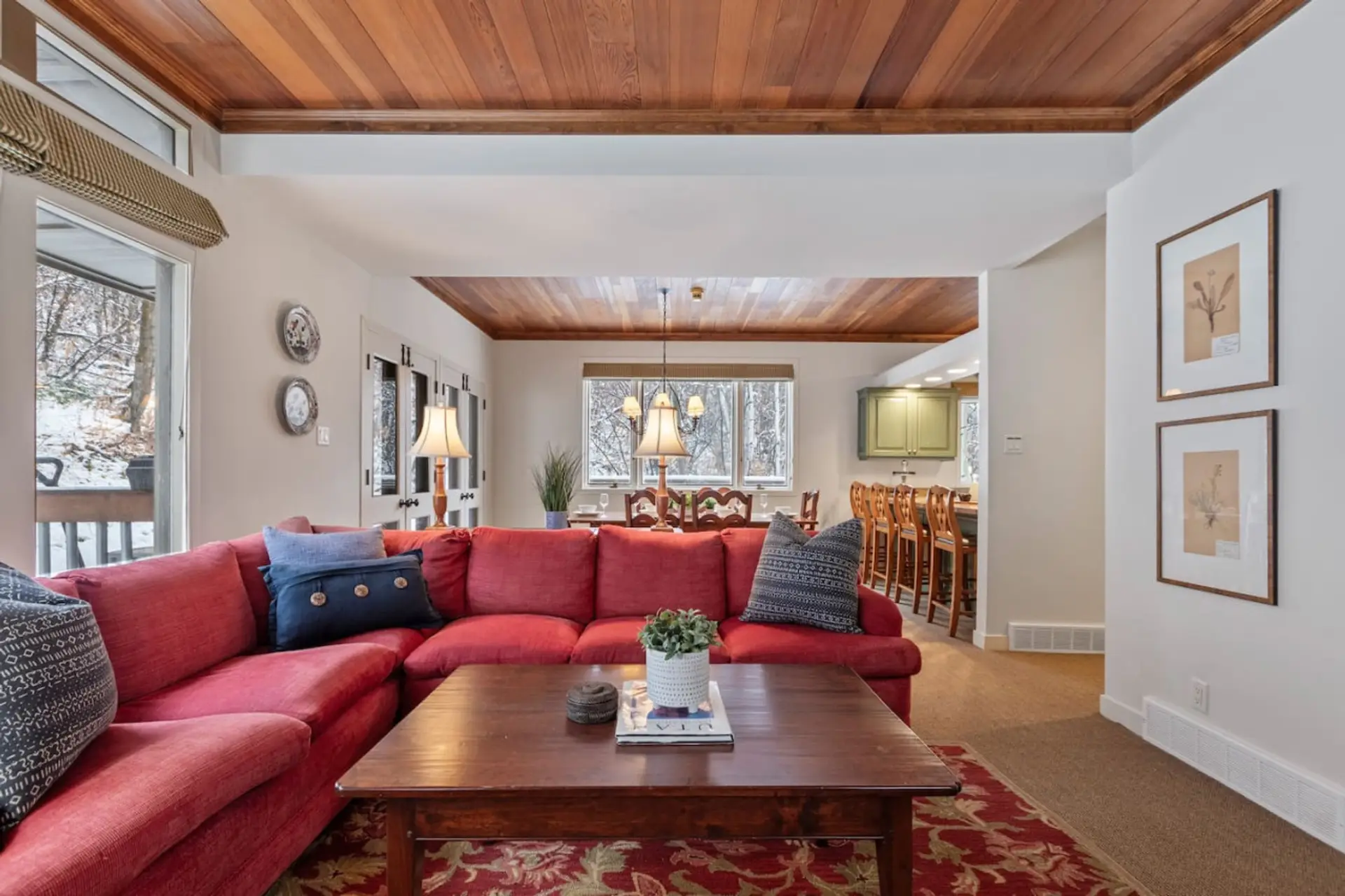 Experience the magic of the mountains in this cozy condo, nestled in a snowy forest with stunning sunlight