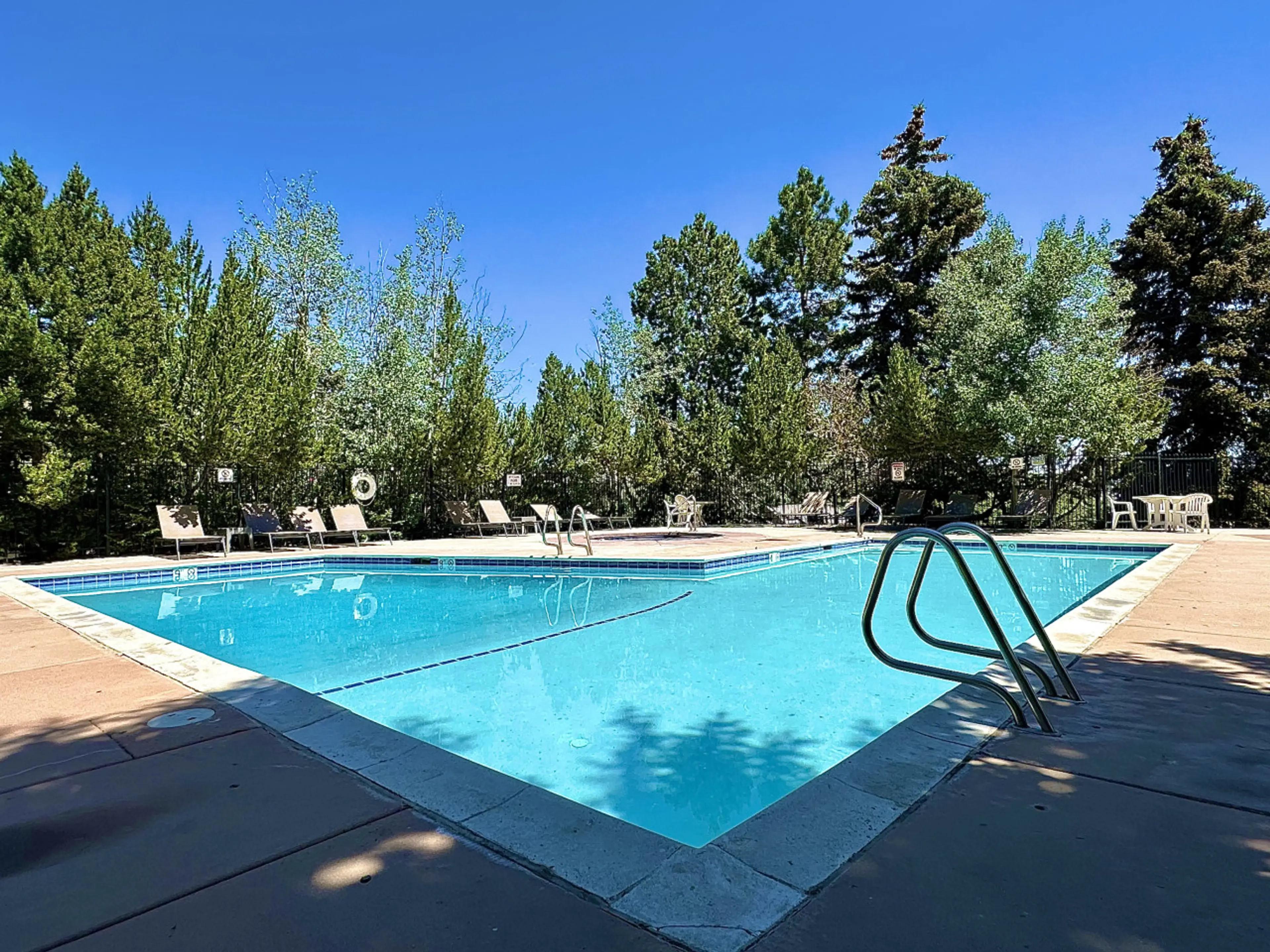 Surrounded by lush natural foliage, our pool and hot tub offer a private, peaceful escape in the heart of the mountains