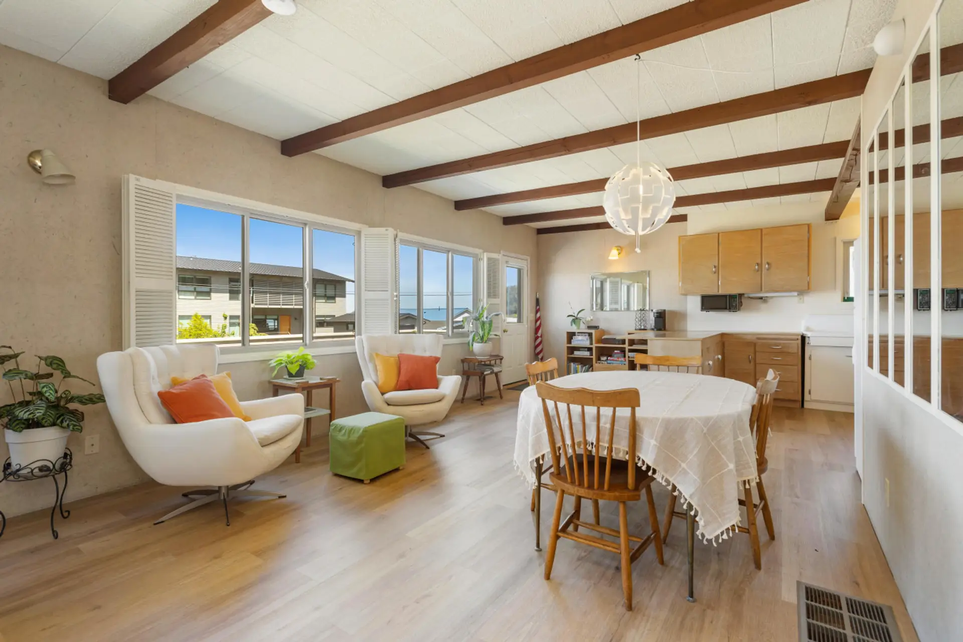 Dining Room: Bright and airy space with scenic views, perfect for meals and good company!