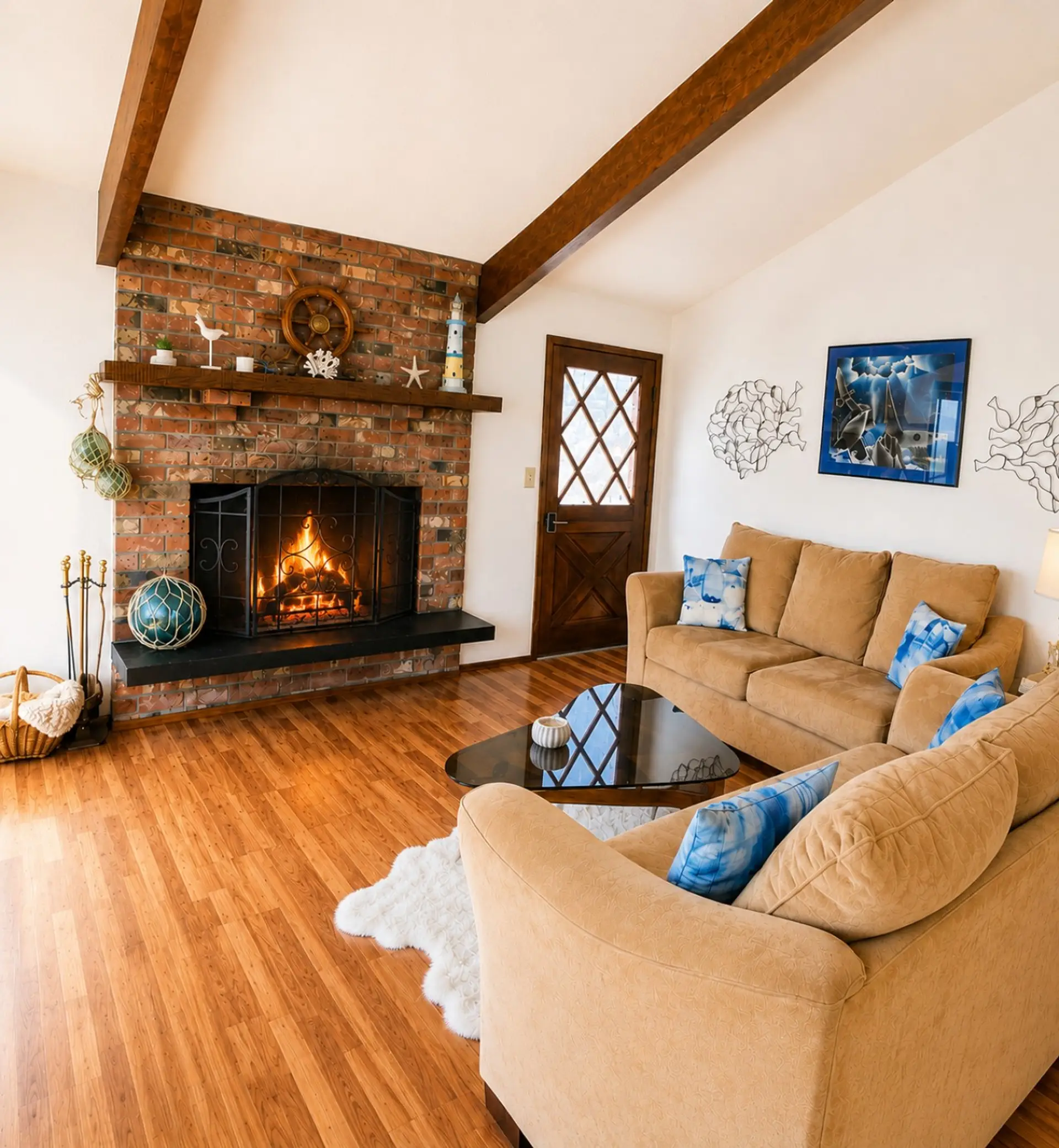 Relax by the wood fire in this inviting coastal living space.