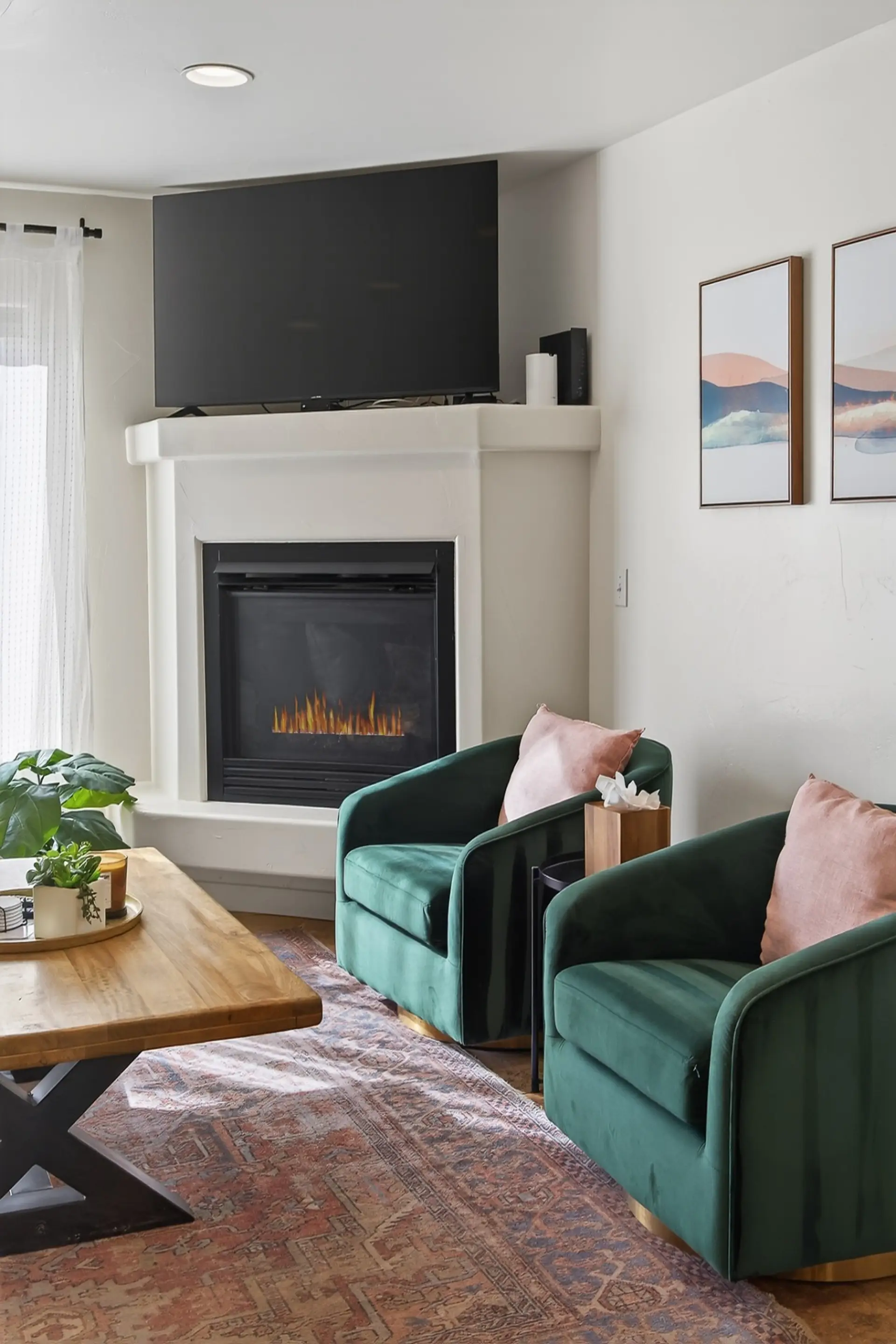 Relax after a day exploring Arches National Park in this bright, open-concept living room with comfortable seating and a cozy fireplace.