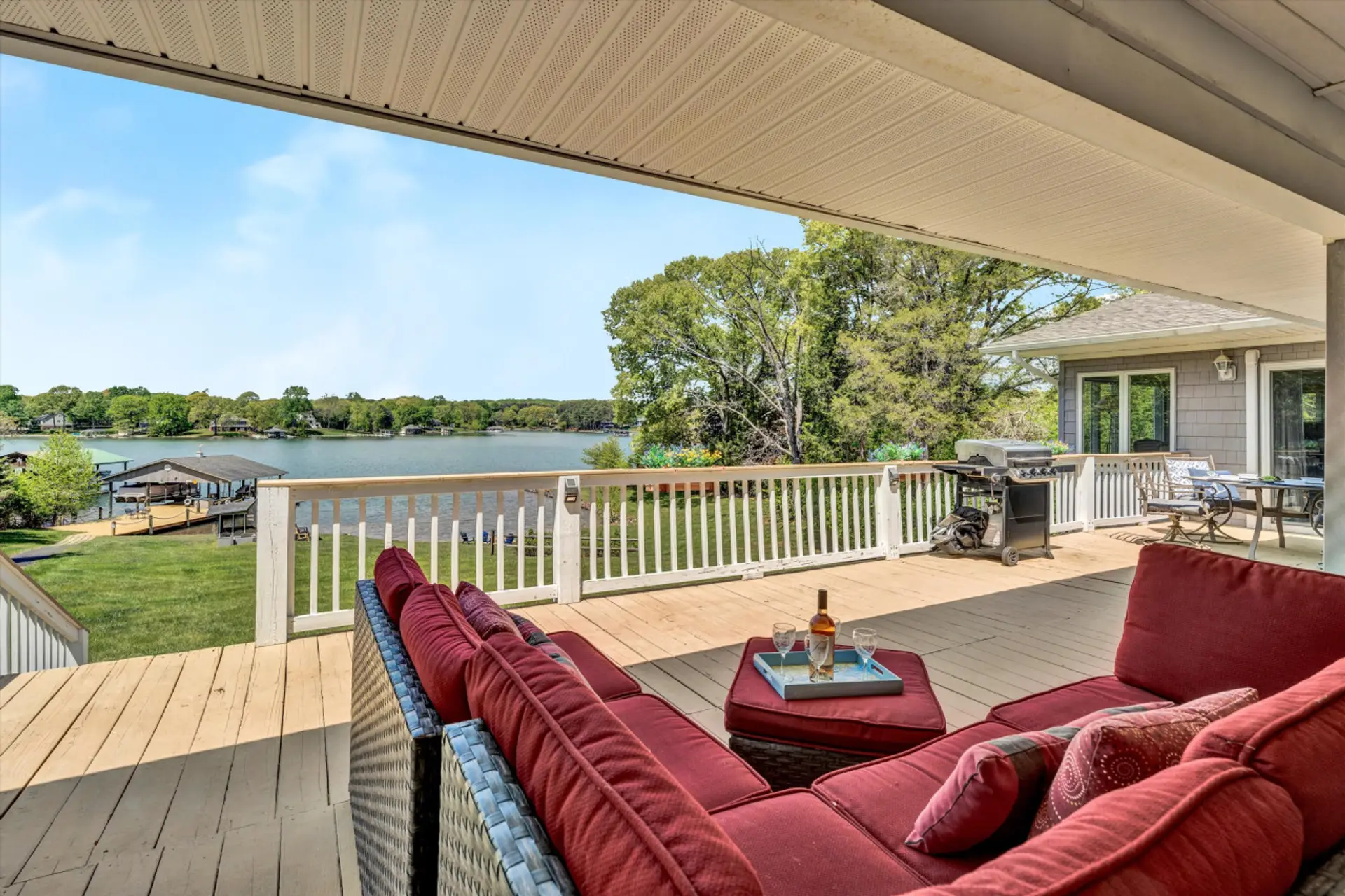 Relax in comfort with stunning lake views from your outdoor seating area.