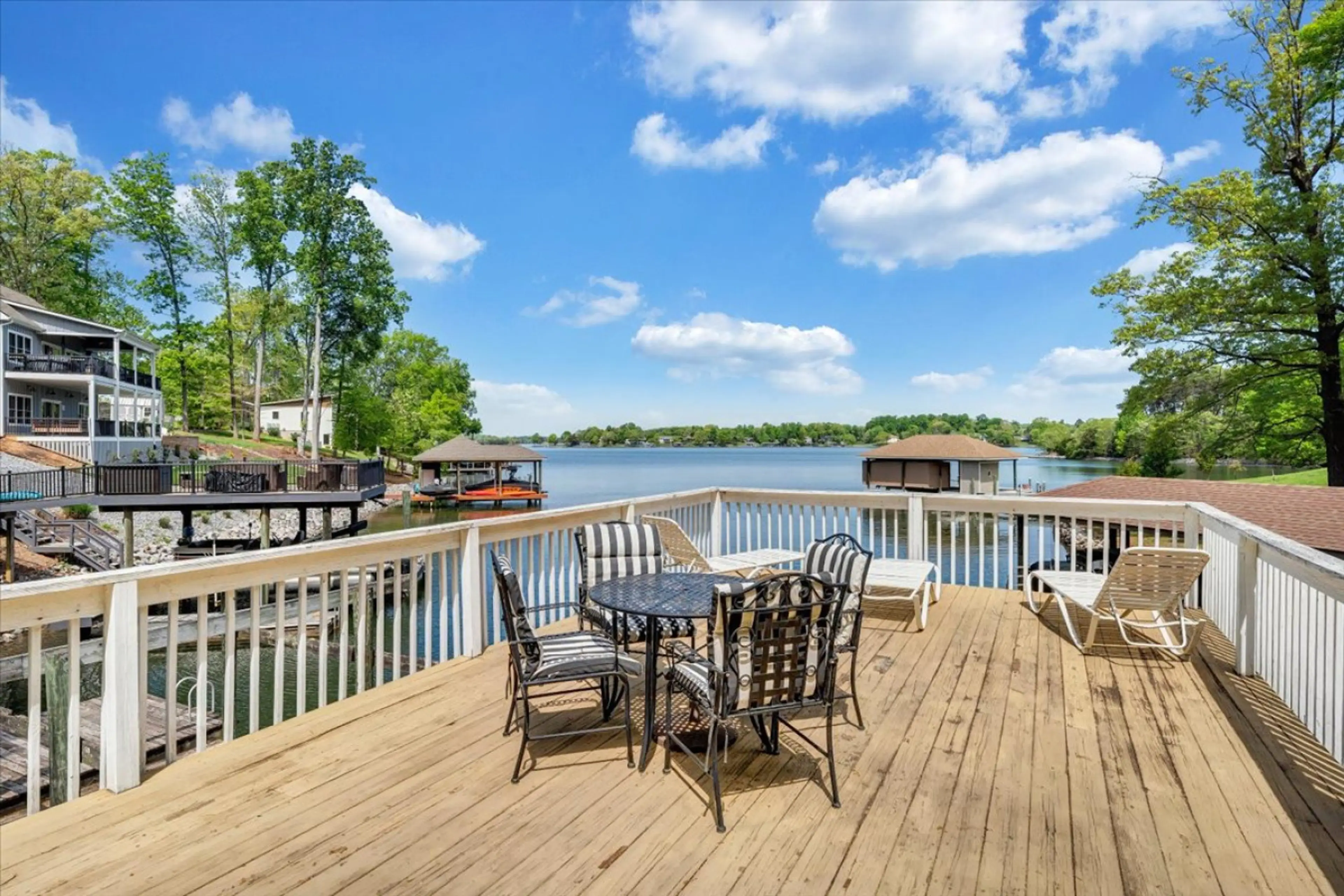 Welcome to Hokie Hideaway! Relax on our spacious party deck by the lake.