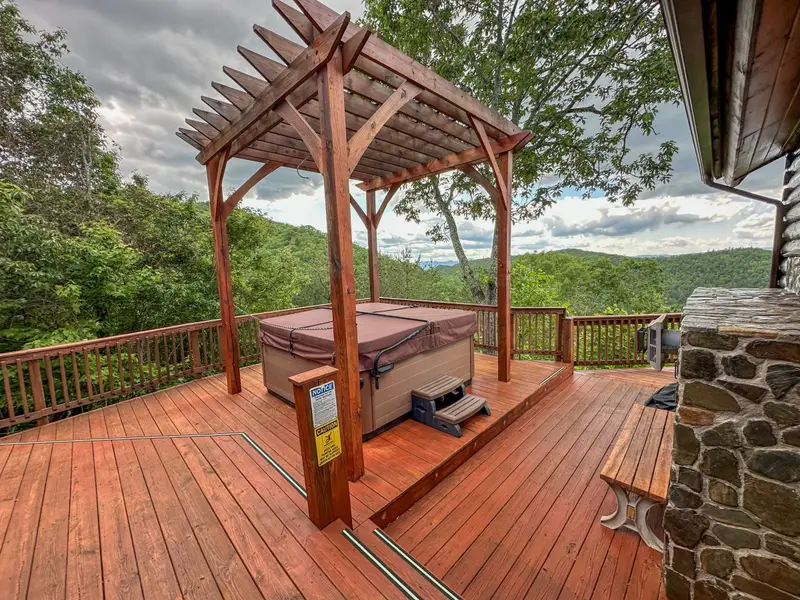 Pergola and deck with stone accents