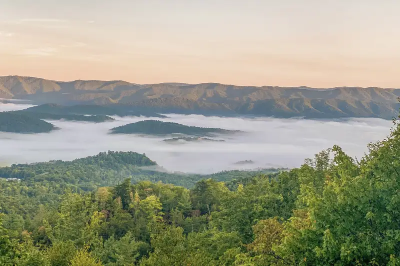 Morning clouds settling into the valley below Cloud 9, the view that gave the cabin its name