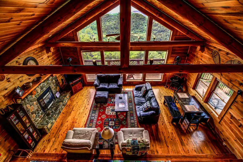Great room seen from the loft, vaulted ceilings and mountain views