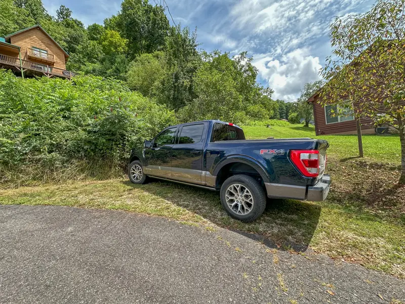 Boat and trailer parking at the bottom of the driveway