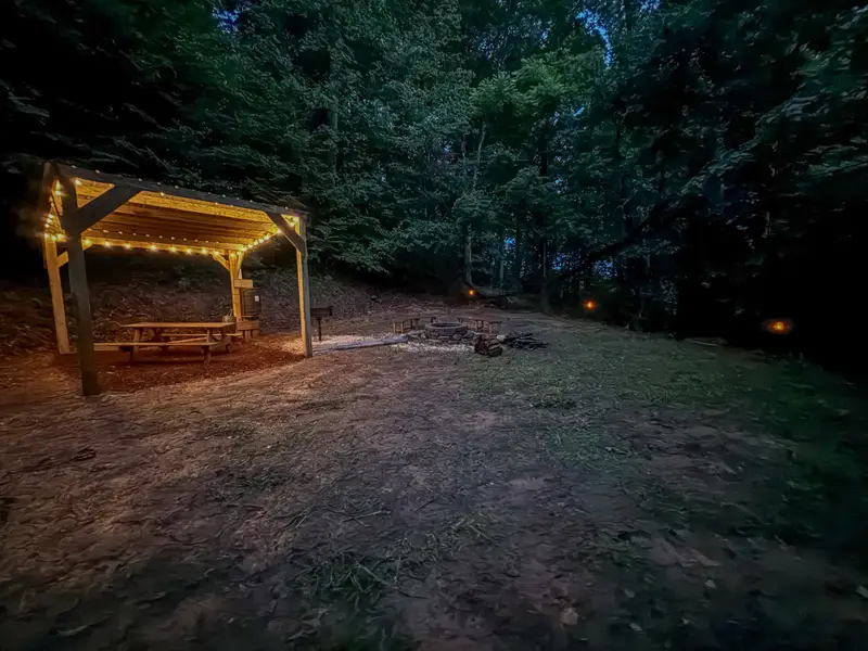 Nature retreat lit up with solar lighting at night