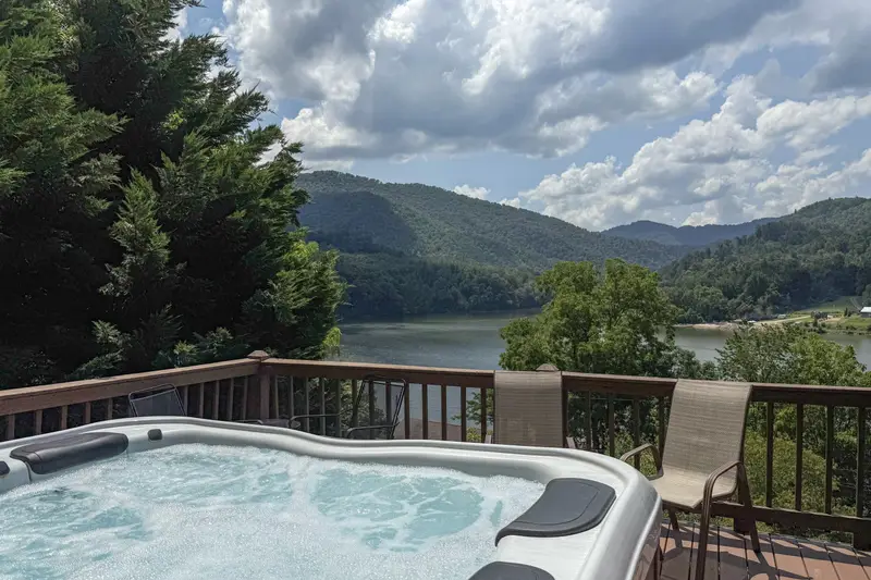 Hot tub with panoramic lake and mountain views