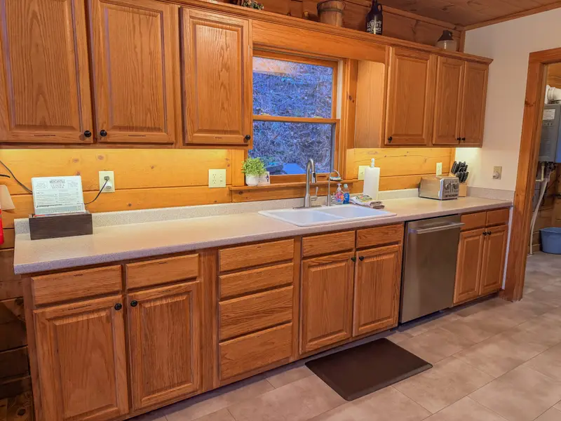 Kitchen with labeled cabinets and plenty of counter space