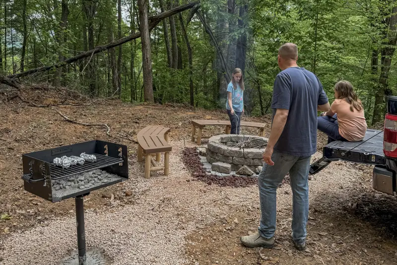 Gathering around the fire pit at the nature retreat