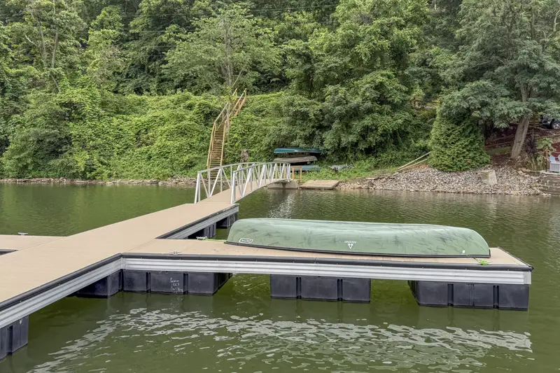 Dock B with the green canoe provided for guests