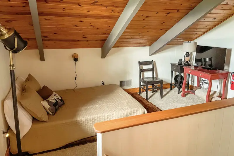 Loft sleeping area outside the bunk room