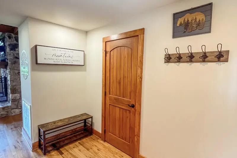 Entry hall with coat hooks and bench