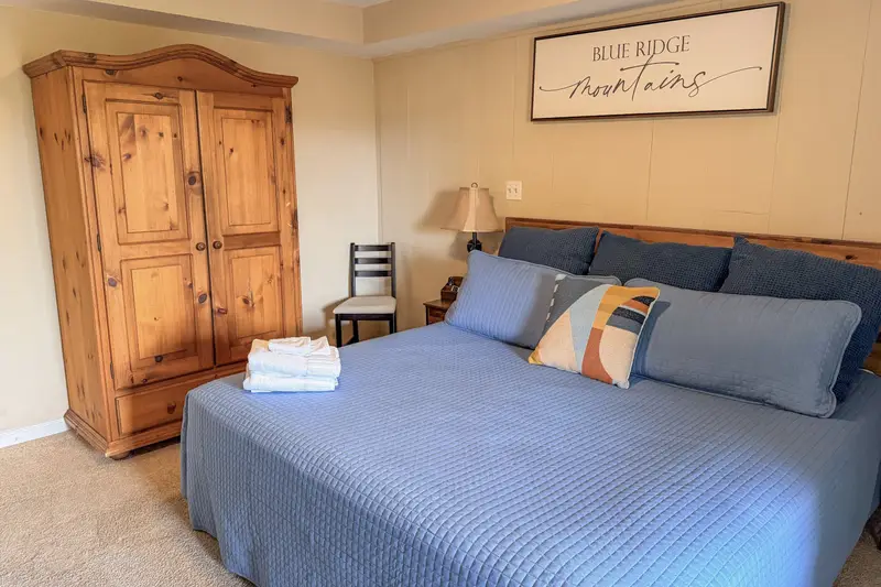 Lower-level king bedroom with deck access